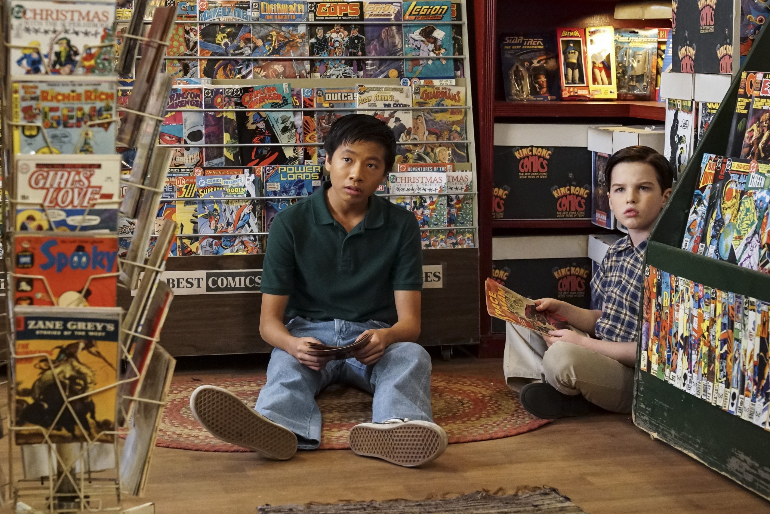 Young Sheldon and friend in a comic book store HD Wallpaper