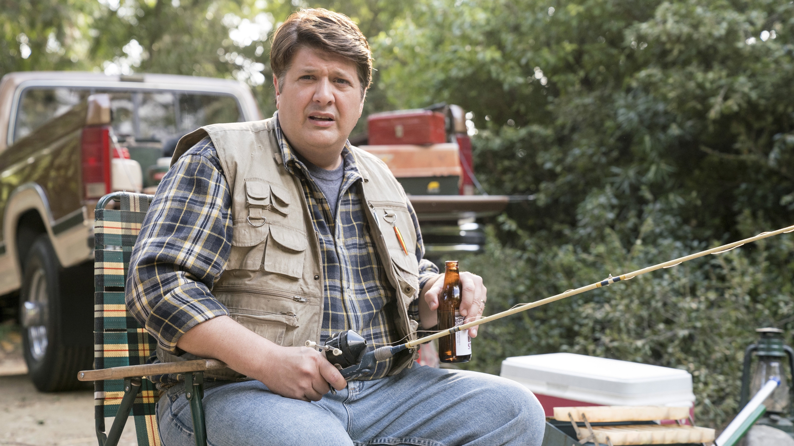 George Cooper fishing outdoors with a beer HD Wallpaper