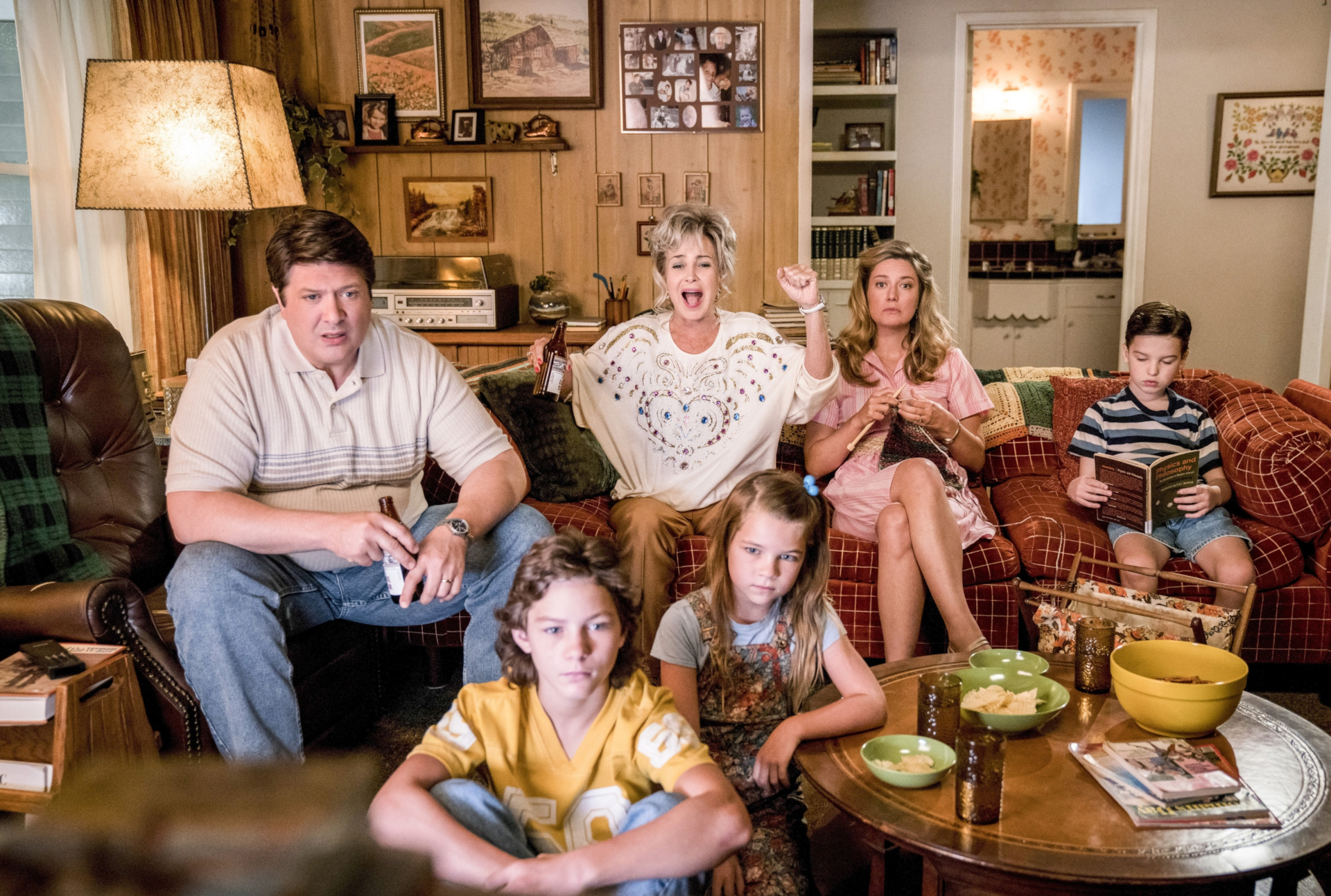 Young Sheldon Cooper family in their living room HD Wallpaper