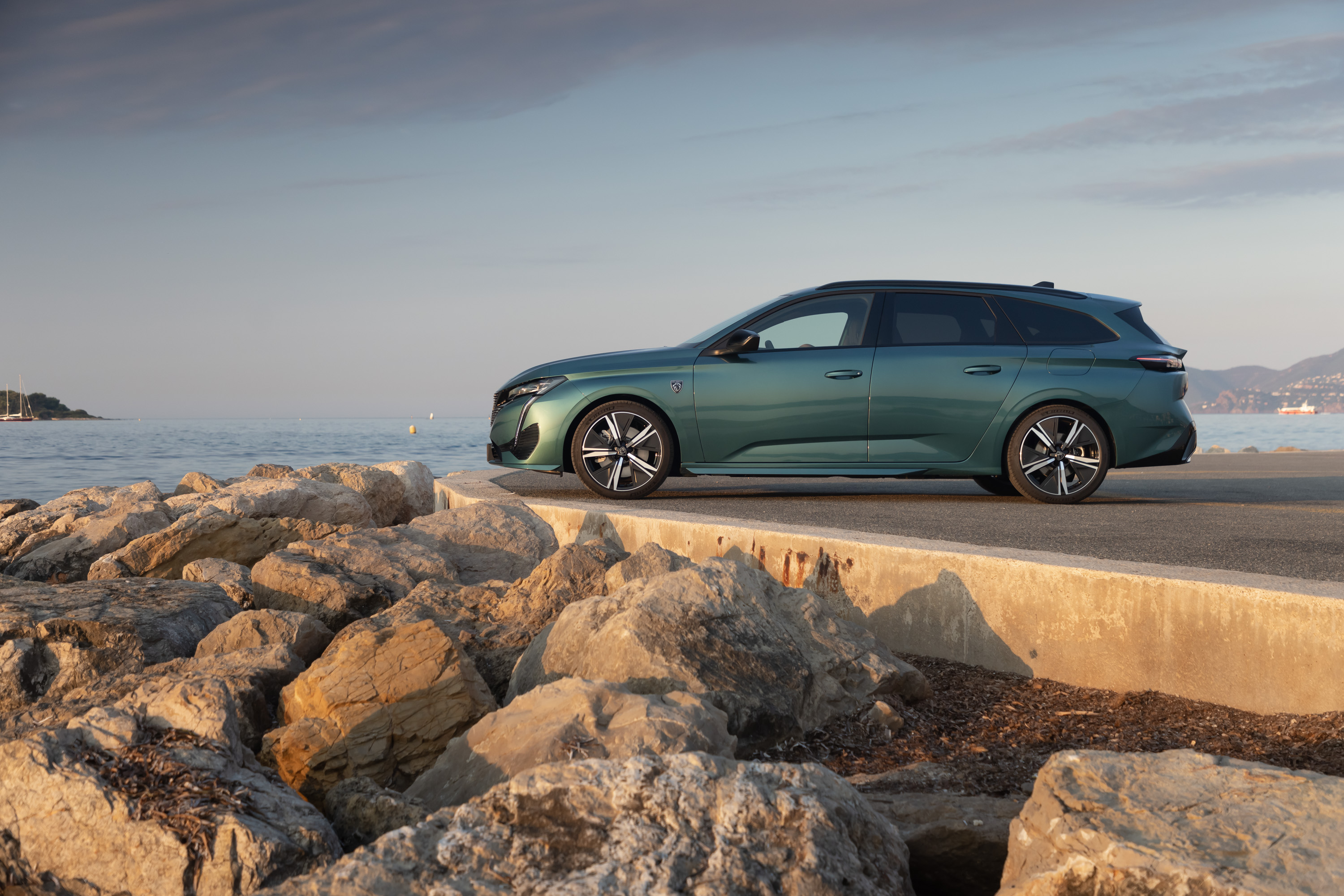 Peugeot 308 SW HYBRID by the sea, golden hour HD Wallpaper