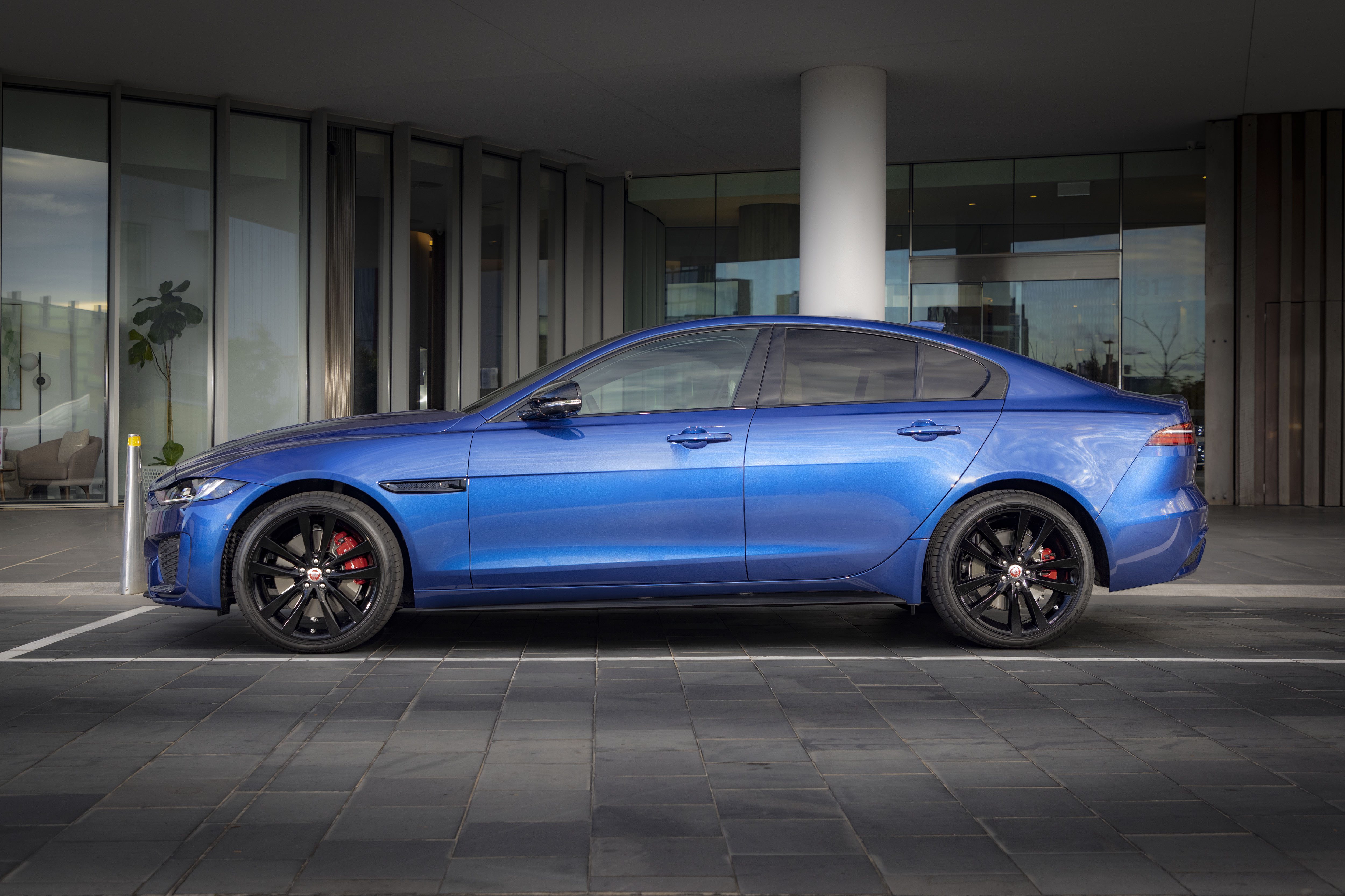 Blue Jaguar XE Luxury Sedan 4K HD Wallpaper