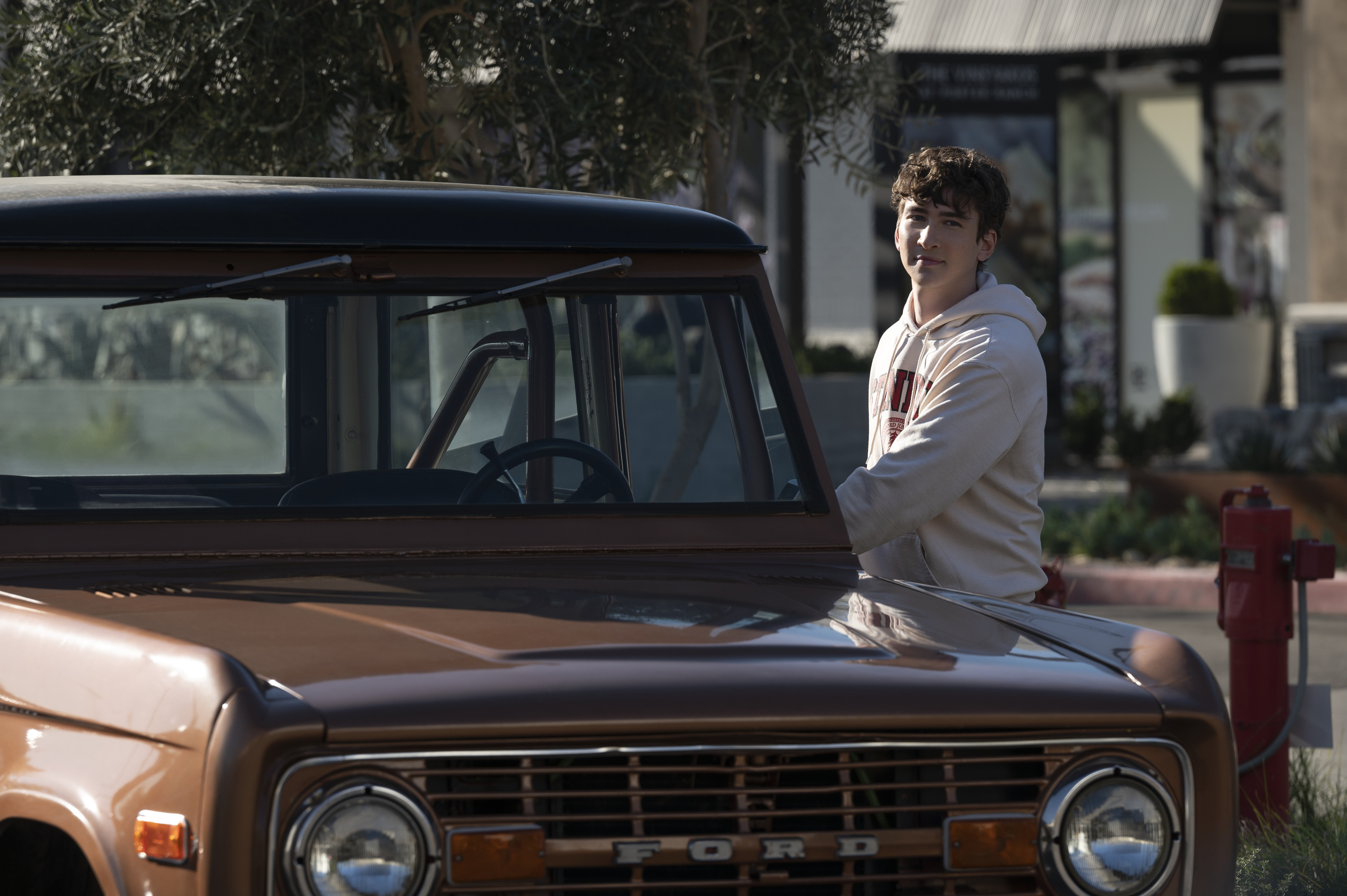 Dylan Arnold with a classic Ford Bronco HD Wallpaper