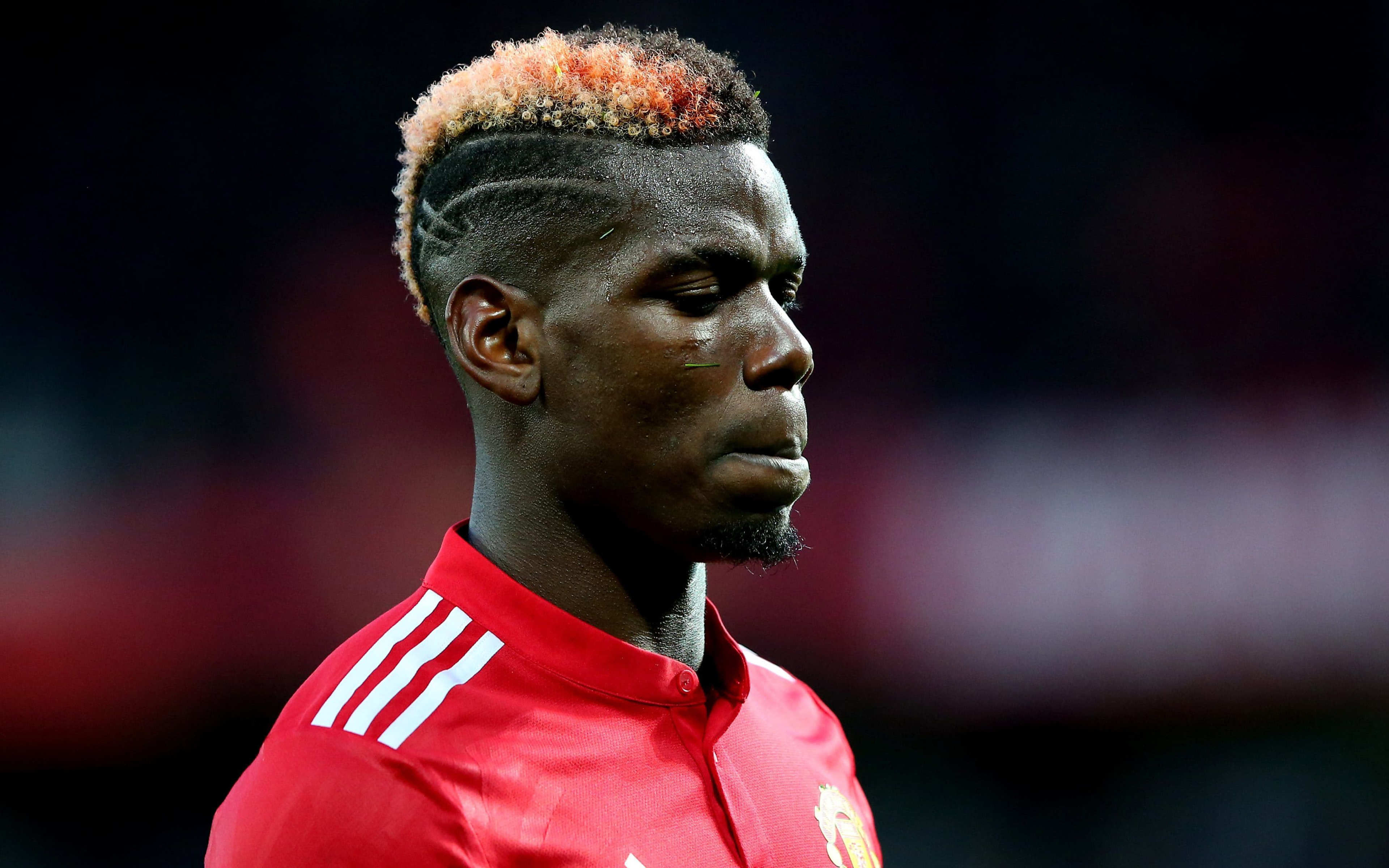 Paul Pogba in Manchester United F.C. red jersey HD Wallpaper