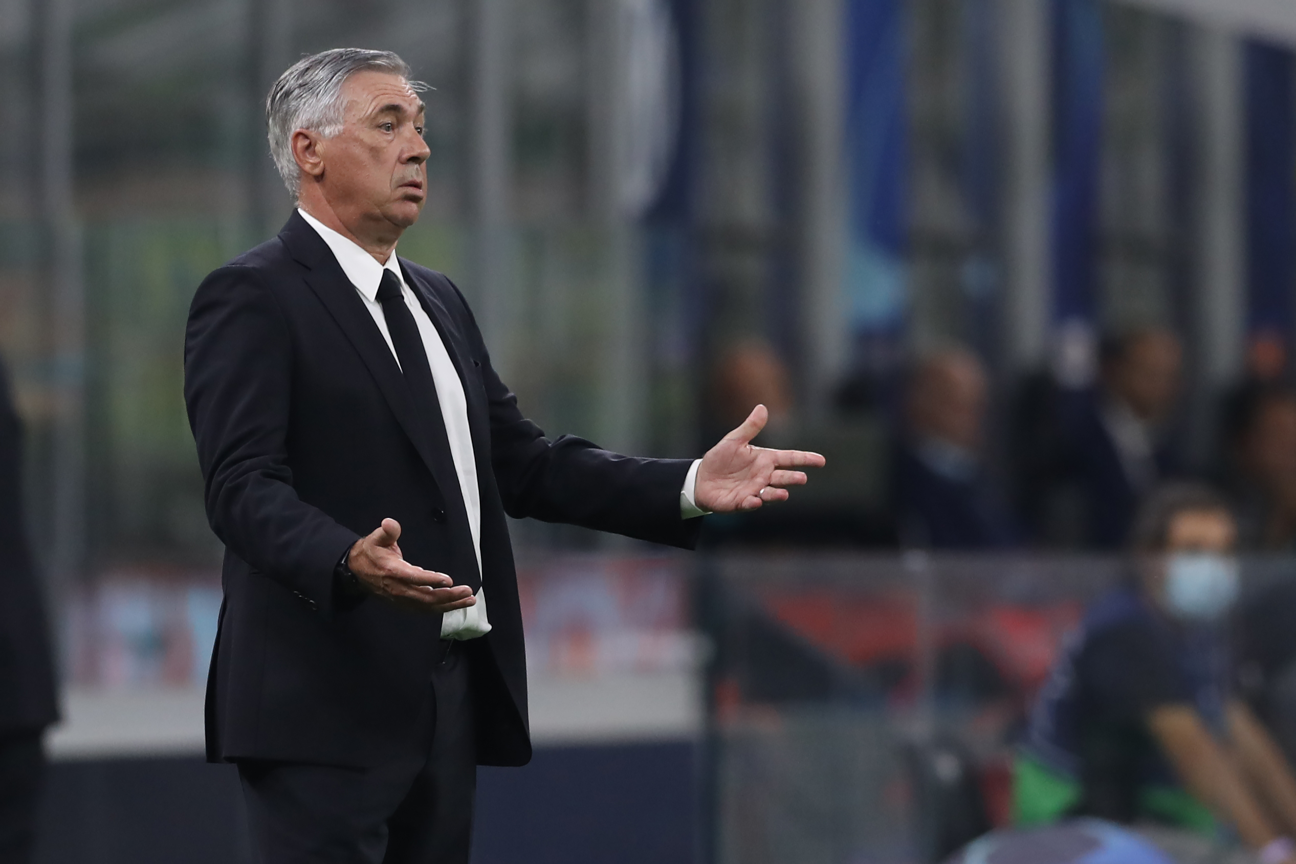 Carlo Ancelotti coaching during a soccer match HD Wallpaper