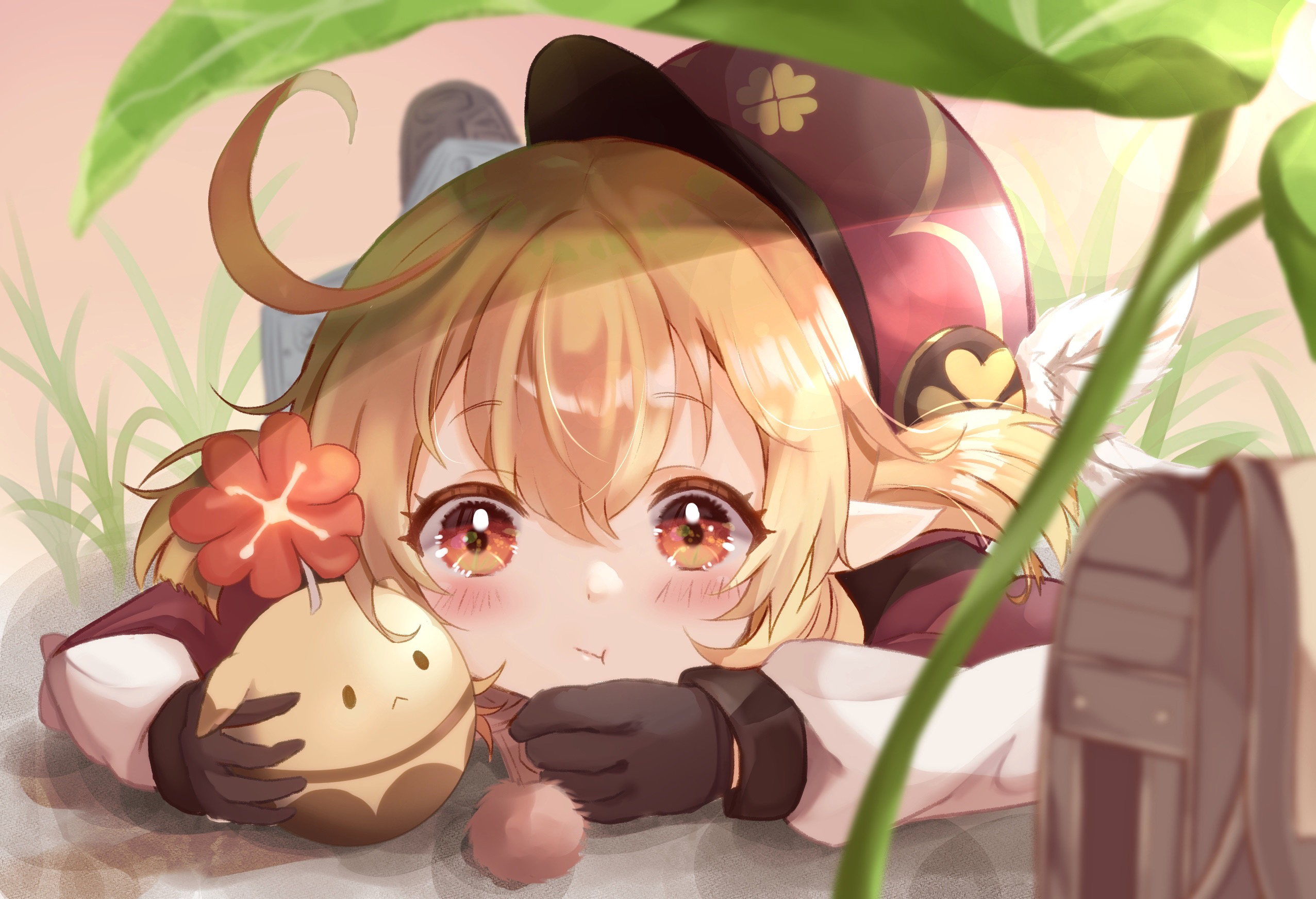 Klee from Genshin Impact peeking cutely under a leaf HD Wallpaper
