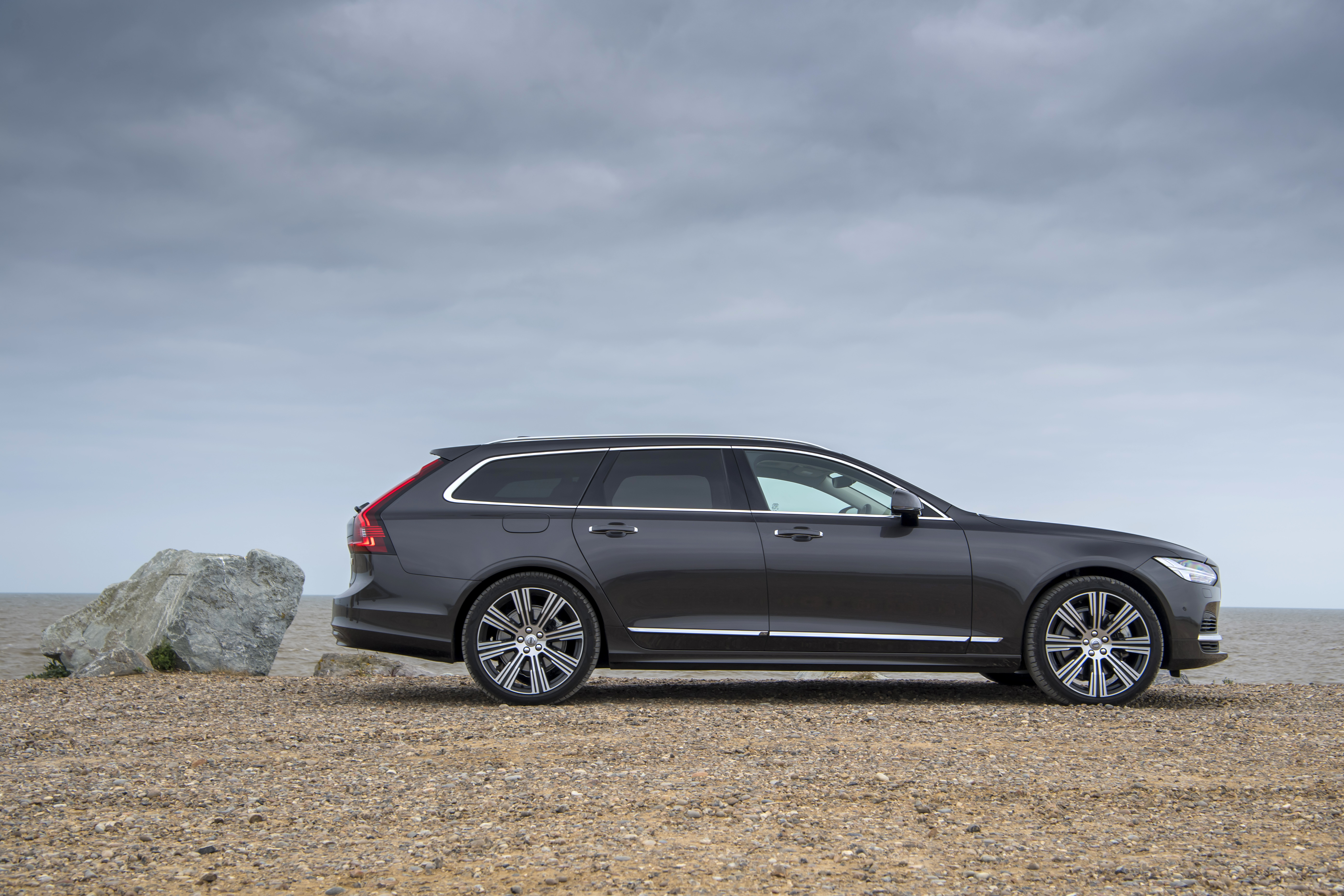 Volvo V90 T6 AWD luxury wagon on a cloudy shore HD Wallpaper