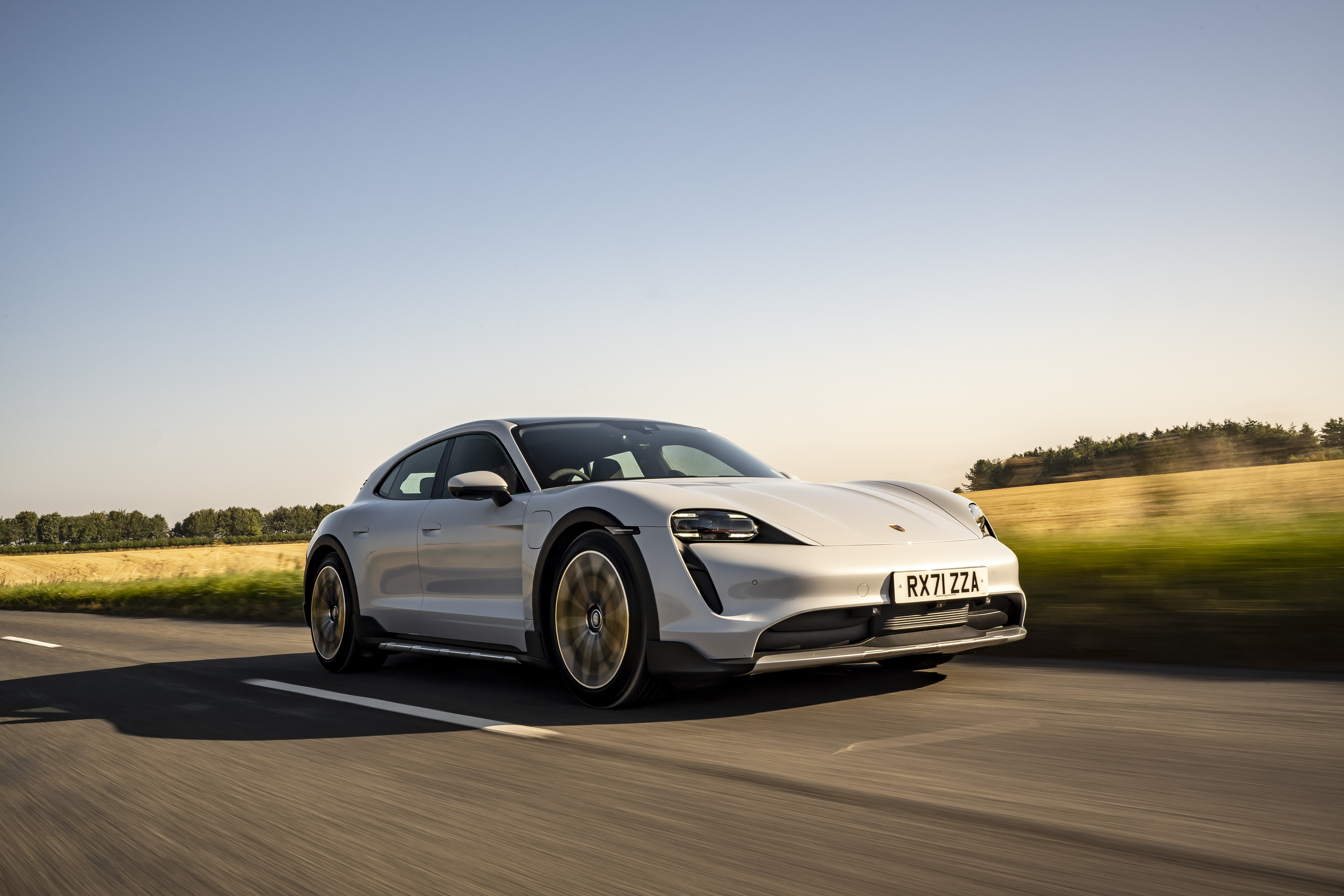 White Porsche Taycan 4S Sport Car Driving on Road HD Wallpaper