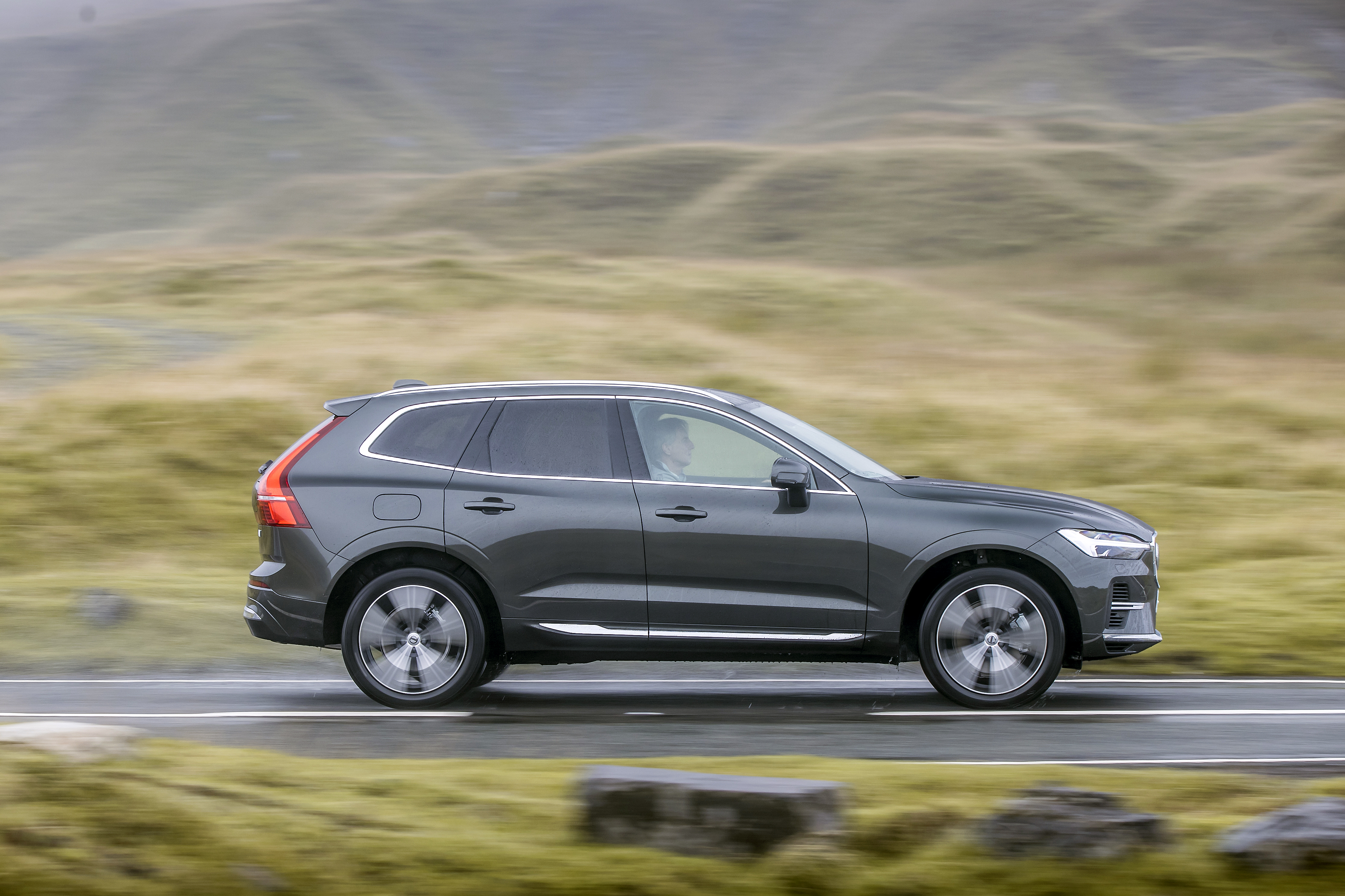 Volvo XC60 T6 Recharge AWD SUV driving outdoors HD Wallpaper