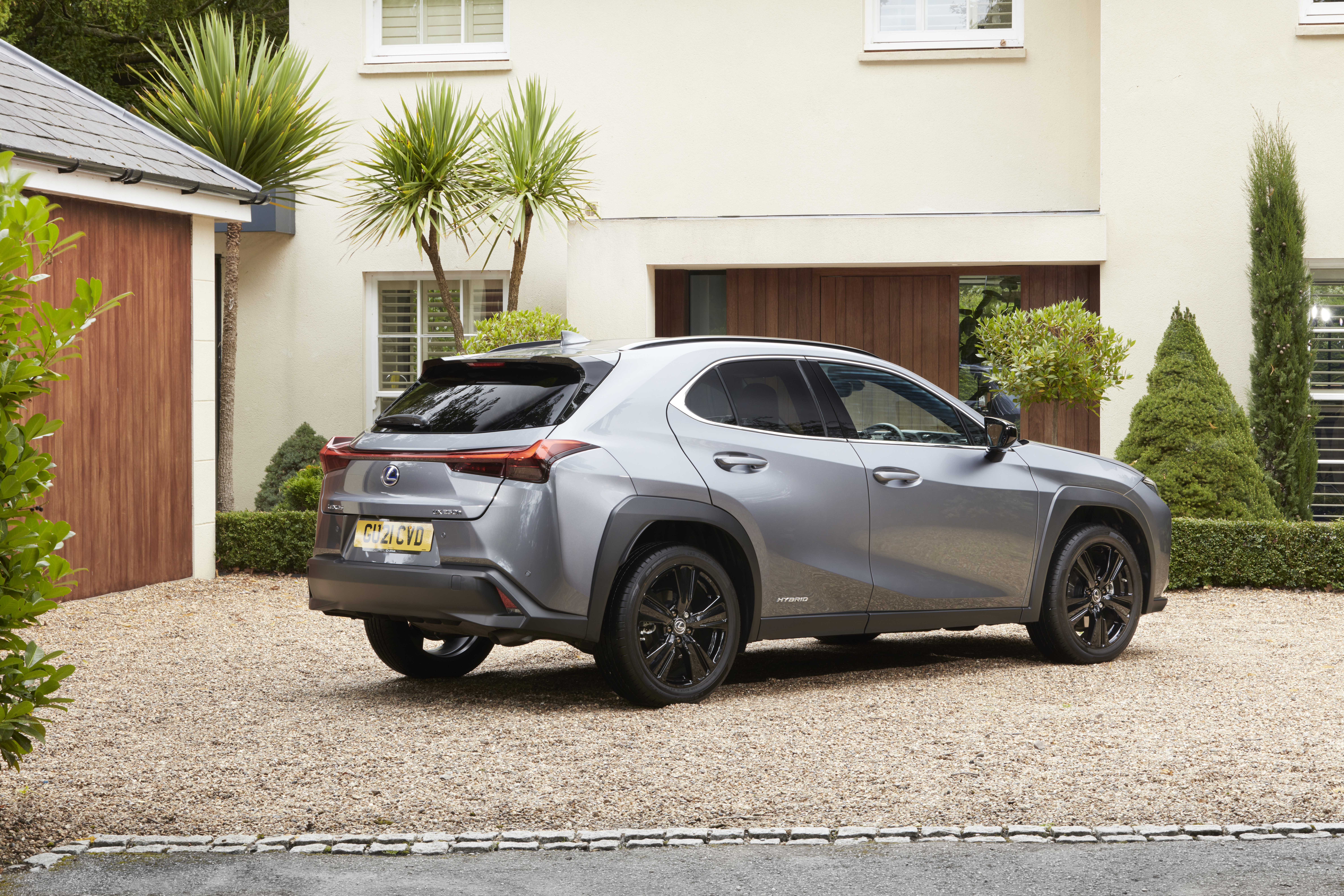 Lexus UX 250H luxury SUV parked at a house HD Wallpaper
