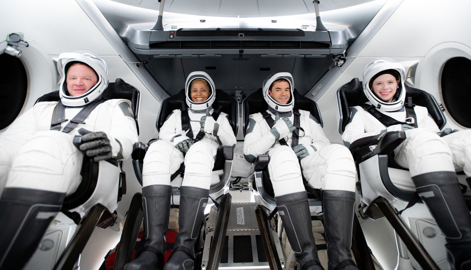Inspiration4 crew smiling in their spacesuits HD Wallpaper