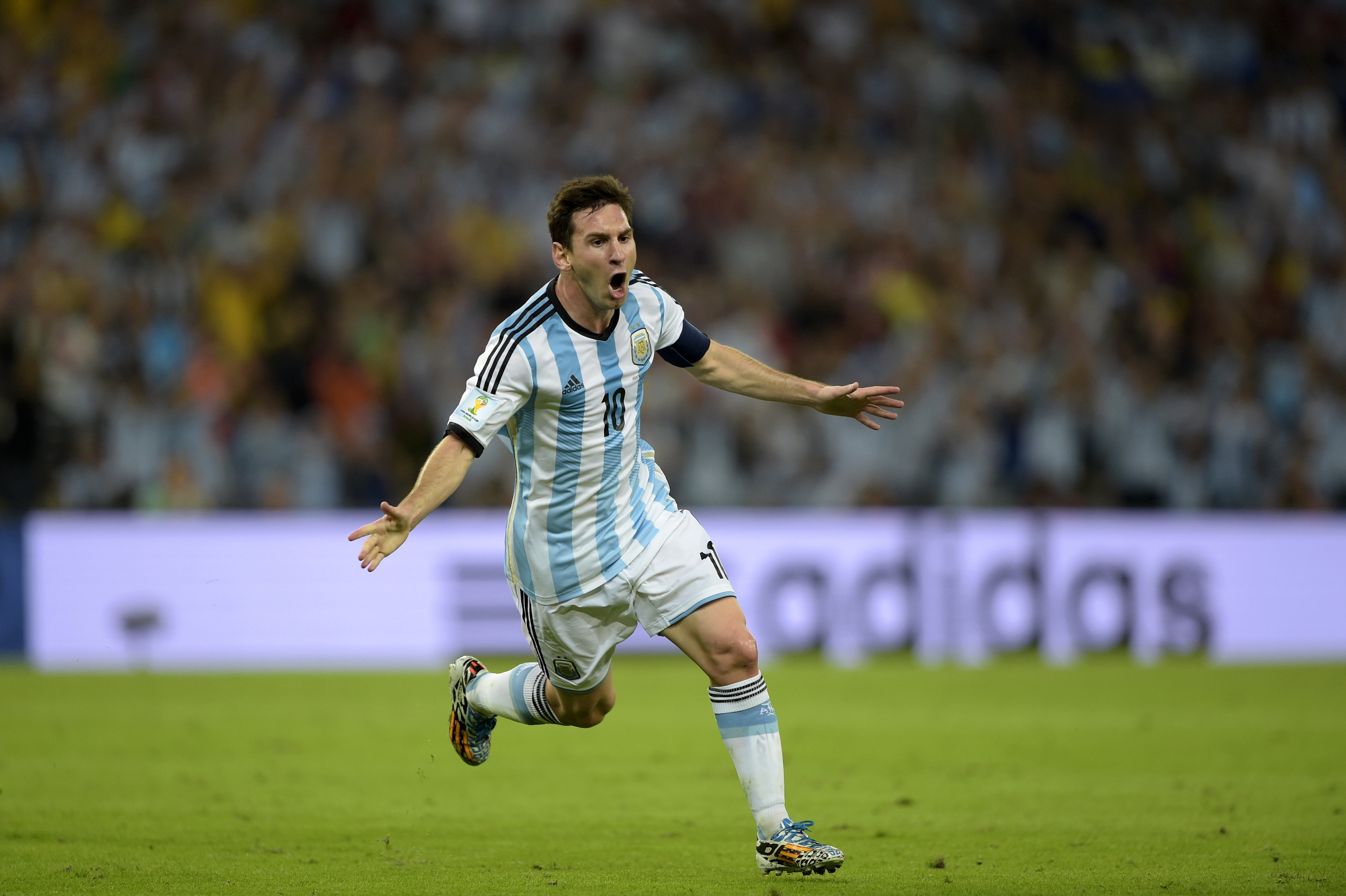 Lionel Messi celebrates a goal for Argentina HD Wallpaper
