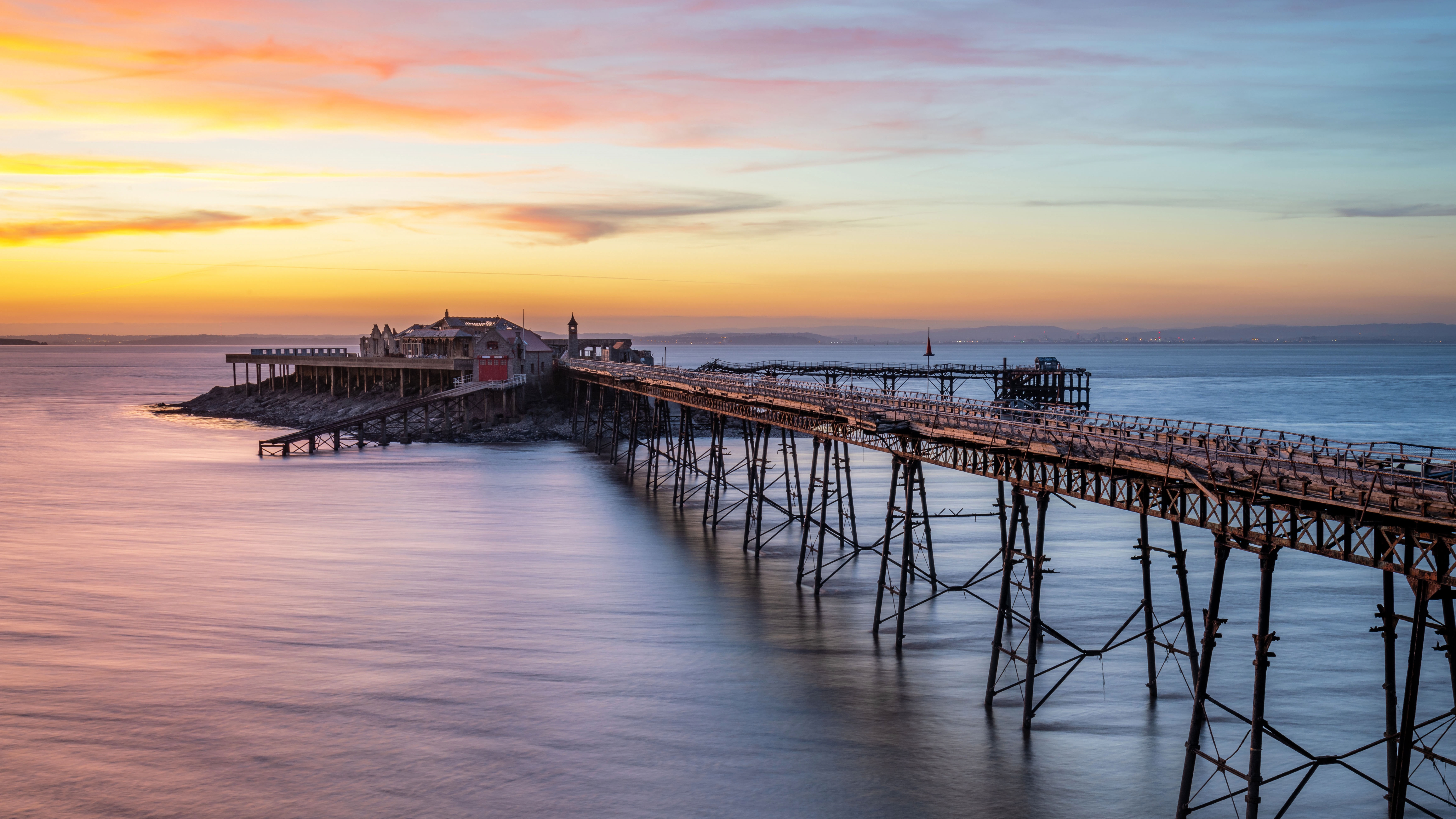 Birnbeck Pier at sunset in Weston-super-Mare, England HD Wallpaper