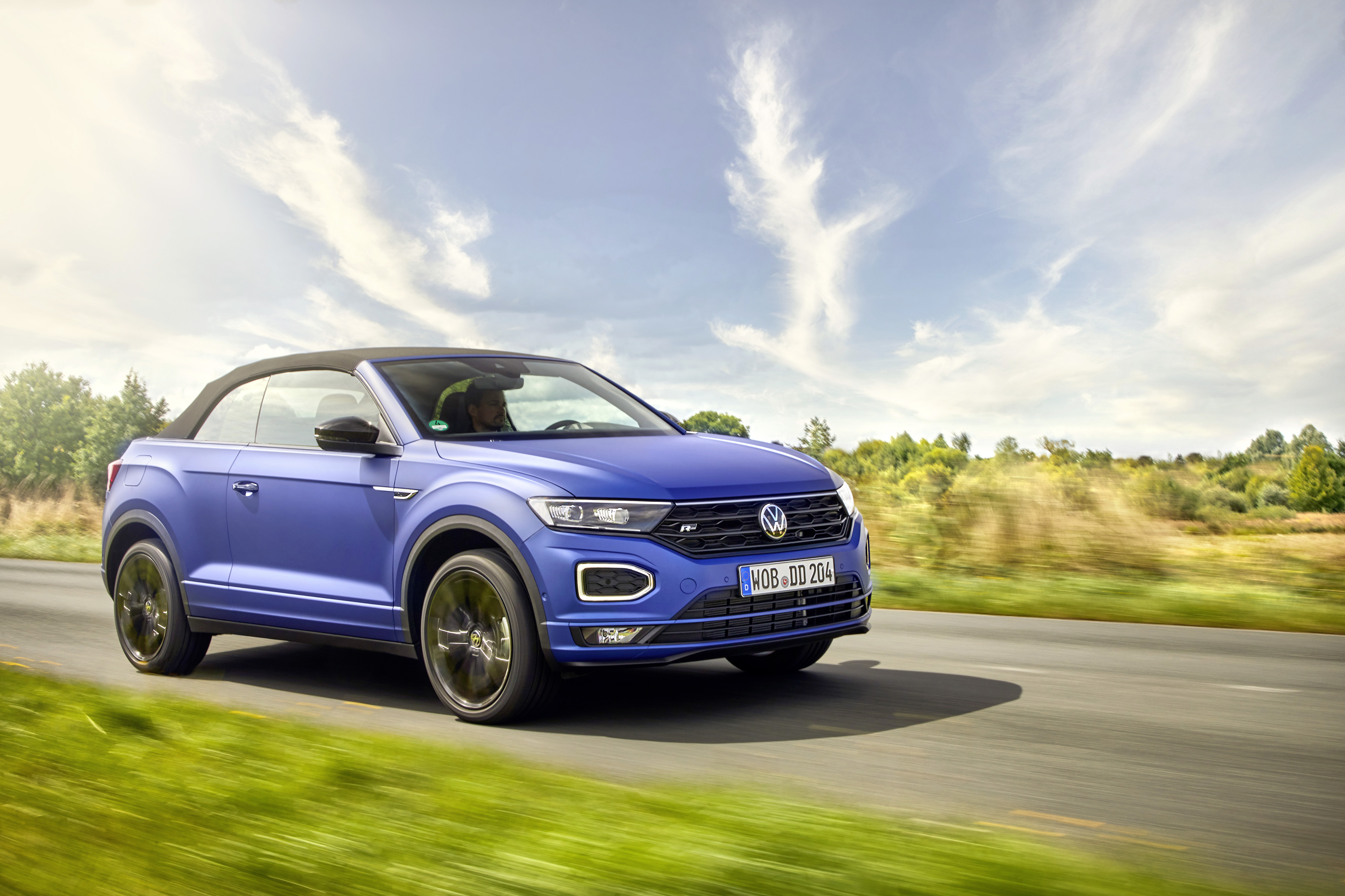Blue Volkswagen T-Roc Cabriolet R-Line driving HD Wallpaper