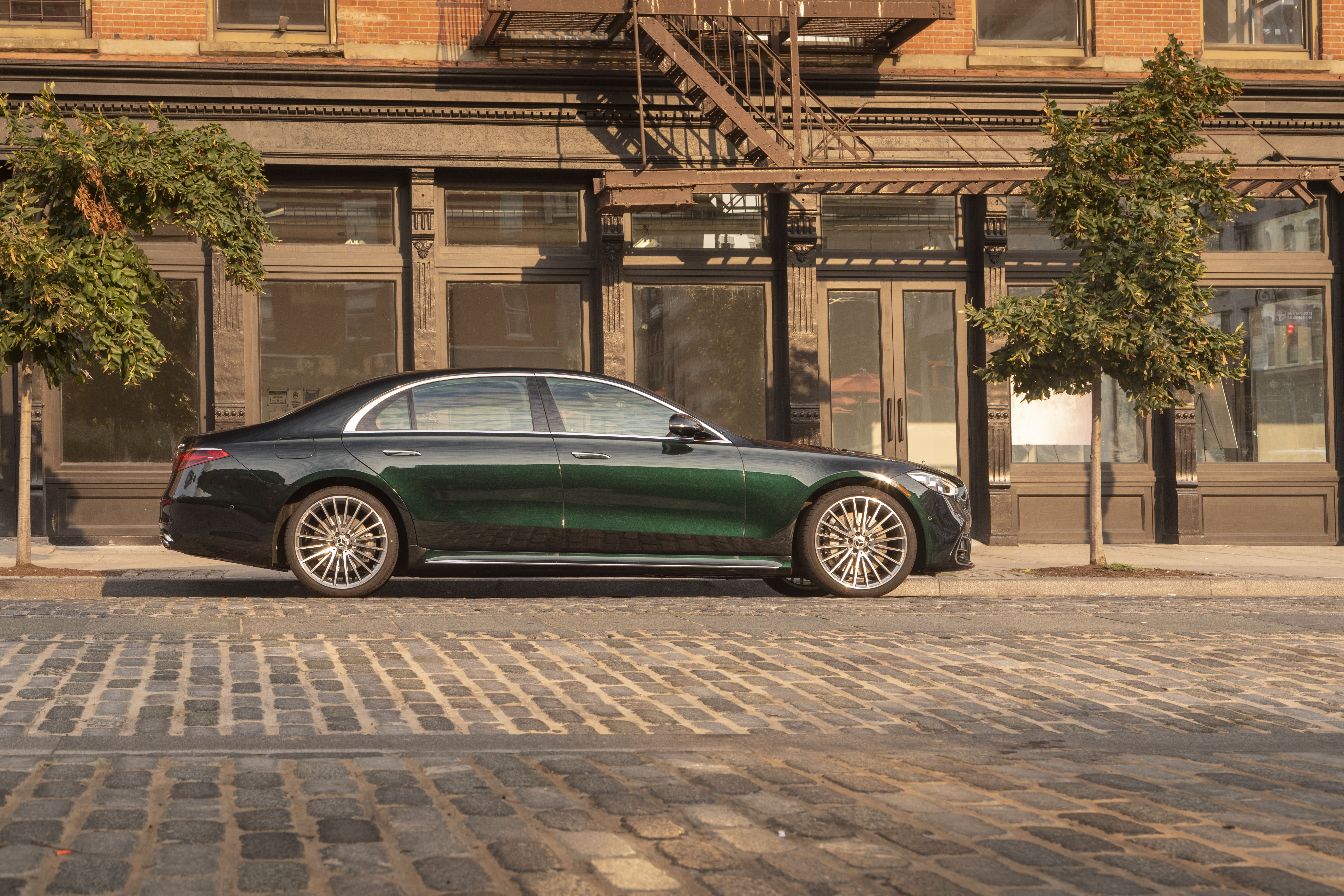 Dark Green Mercedes-Benz S 500 on Cobblestone Street HD Wallpaper