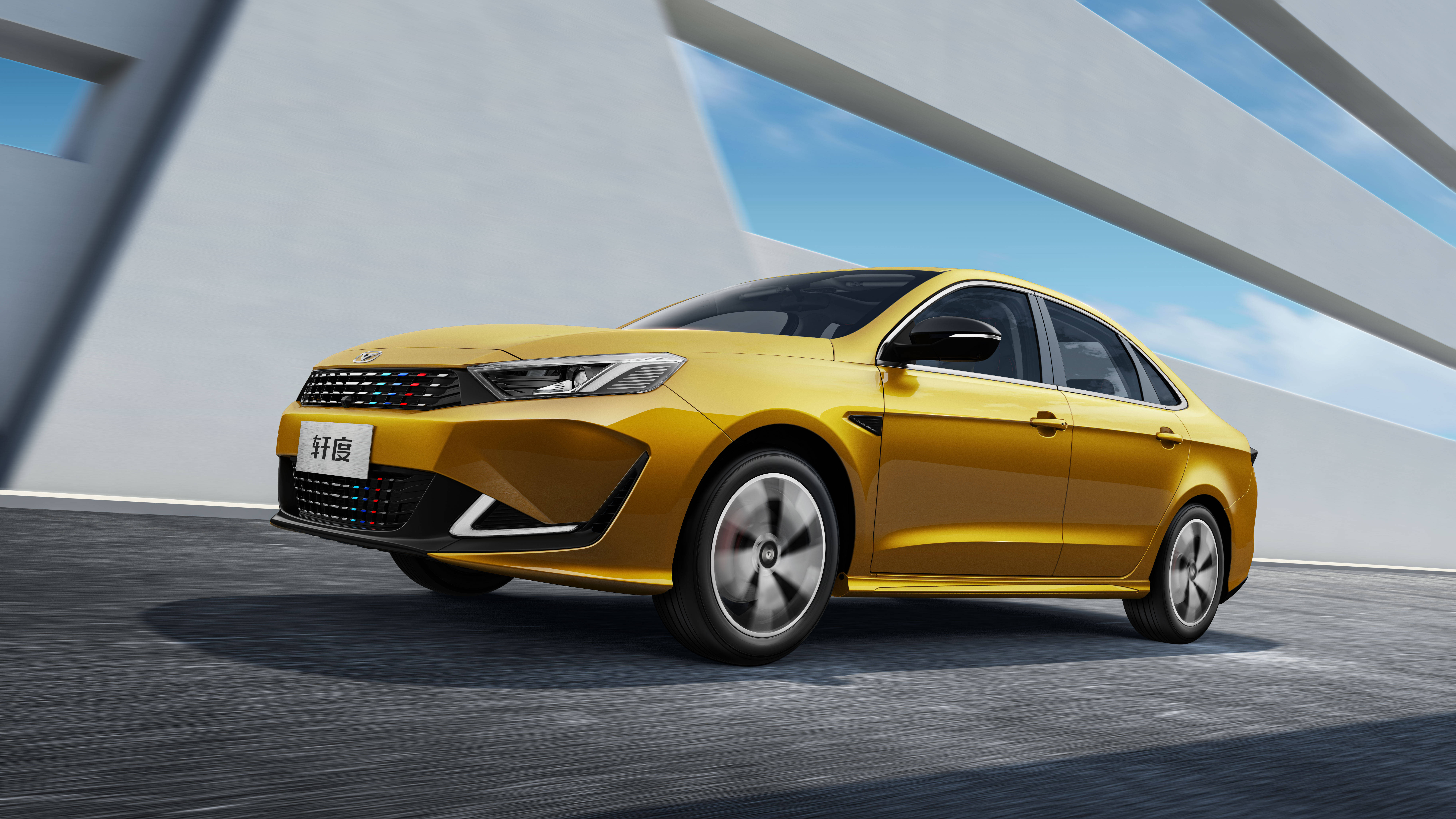 Yellow Cowin Xuandu sedan on a modern road HD Wallpaper