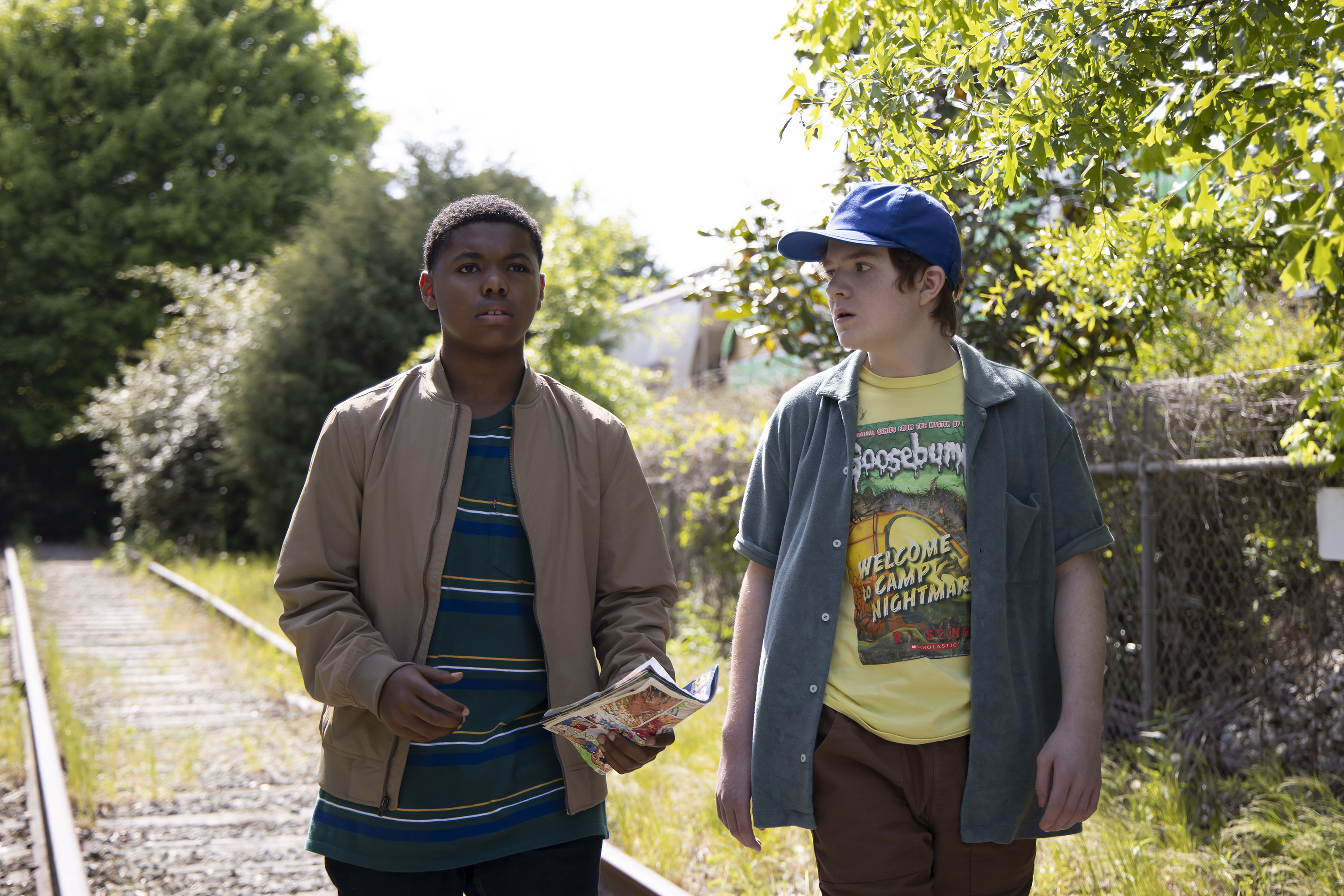 Just Beyond: Cedric Joe and Jack Gore on train tracks HD Wallpaper