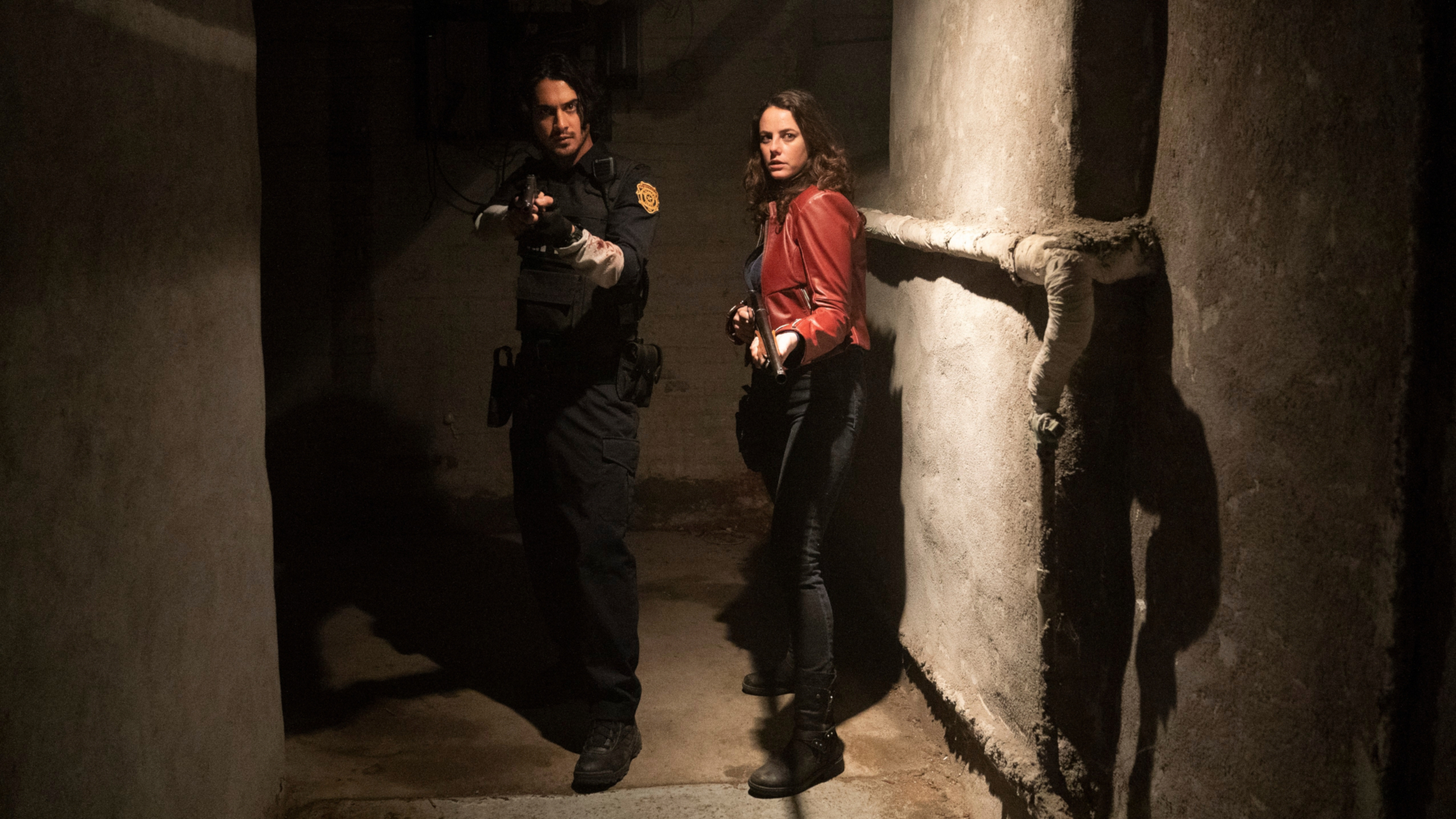 Leon S. Kennedy and Claire Redfield in Welcome To Raccoon City HD Wallpaper