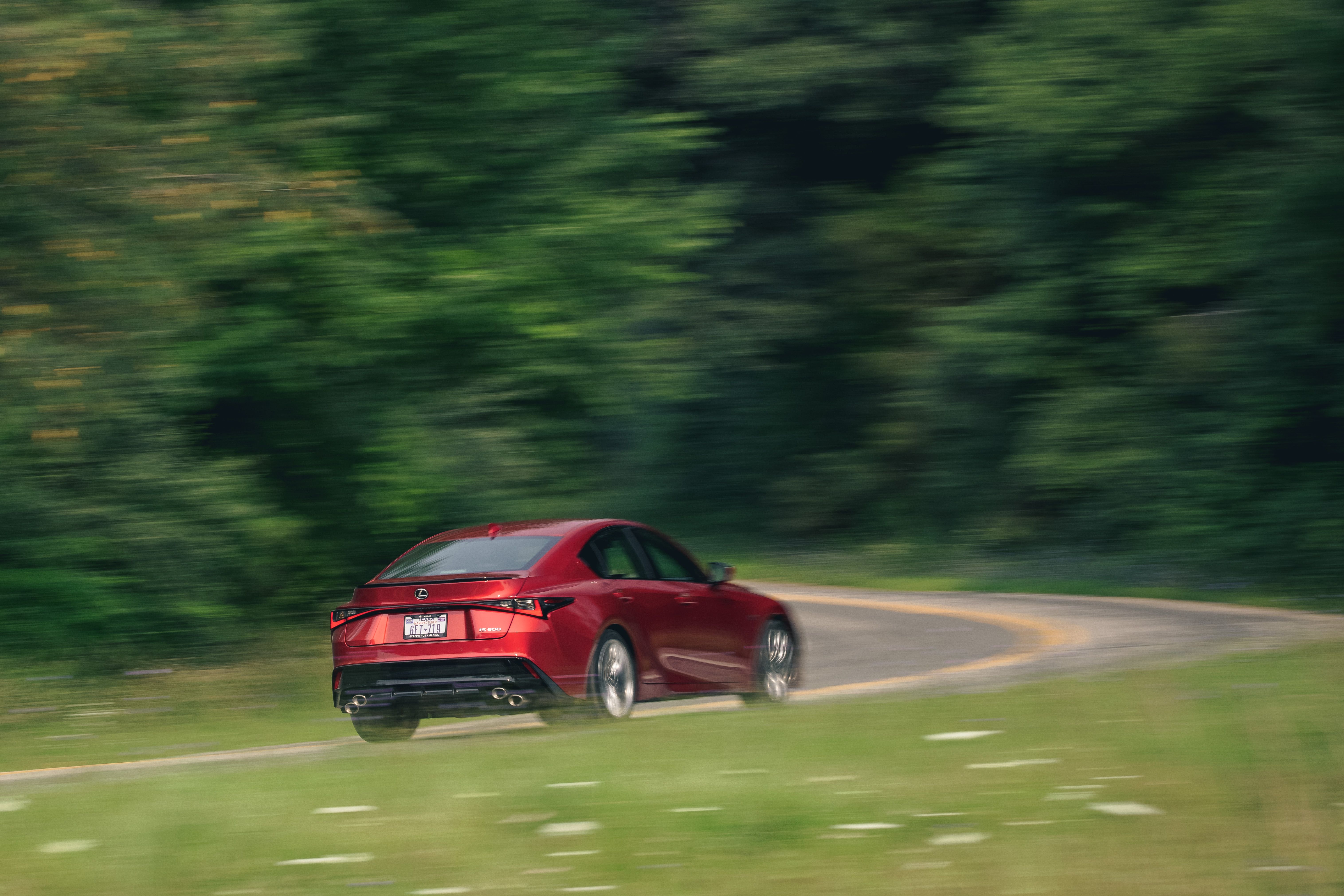 Red Lexus IS 500 F SPORT Performance on winding road HD Wallpaper