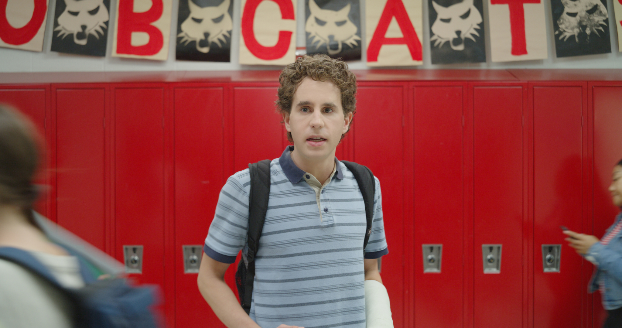 Ben Platt as Evan Hansen in school hallway with cast HD Wallpaper