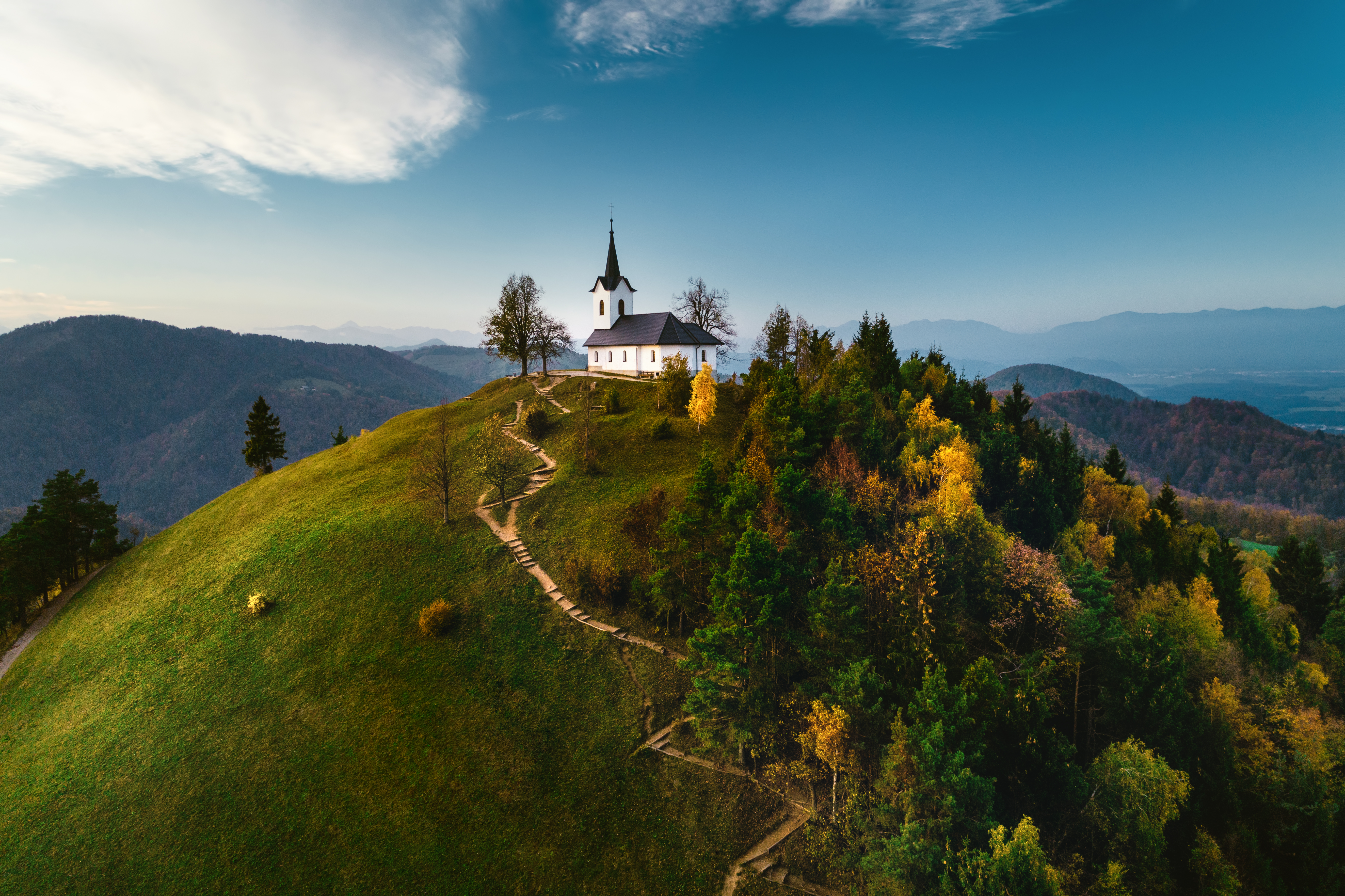Sv. Jakob Hill Church with Autumn Trees near Ljubljana HD Wallpaper