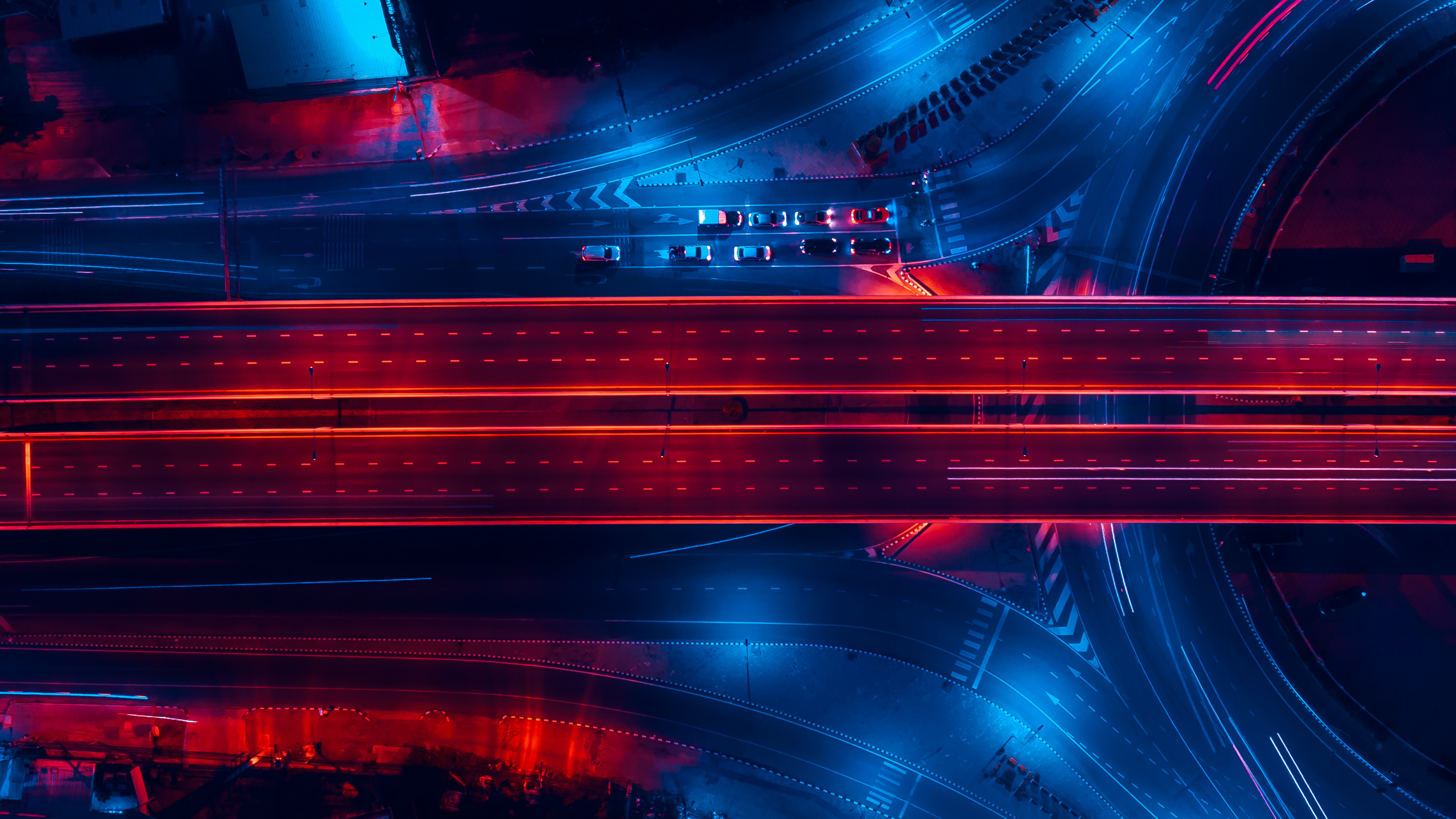 Neon Red and Blue Highway Interchange at Night HD Wallpaper