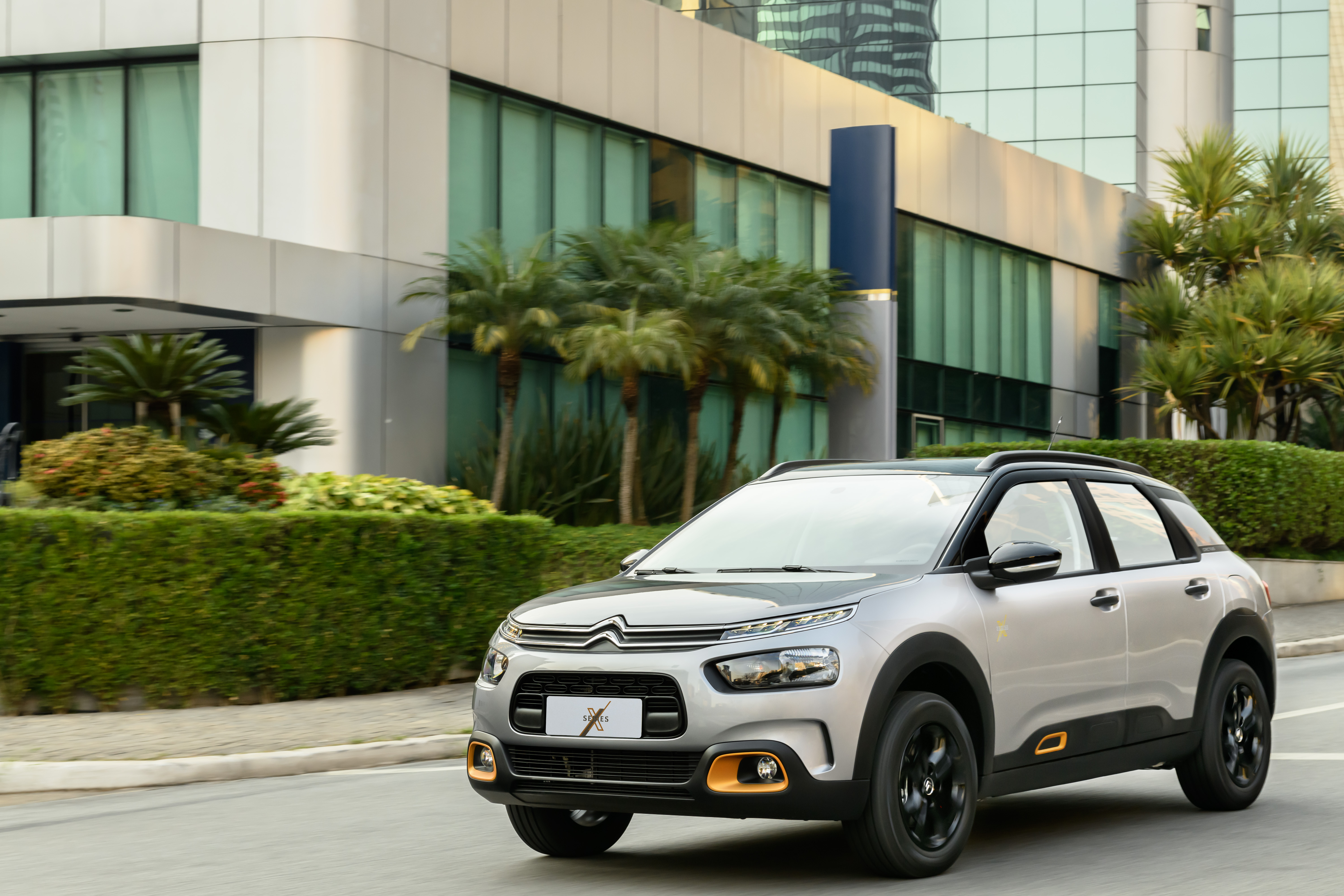 Silver Citroën C4 Cactus X-Series SUV driving HD Wallpaper