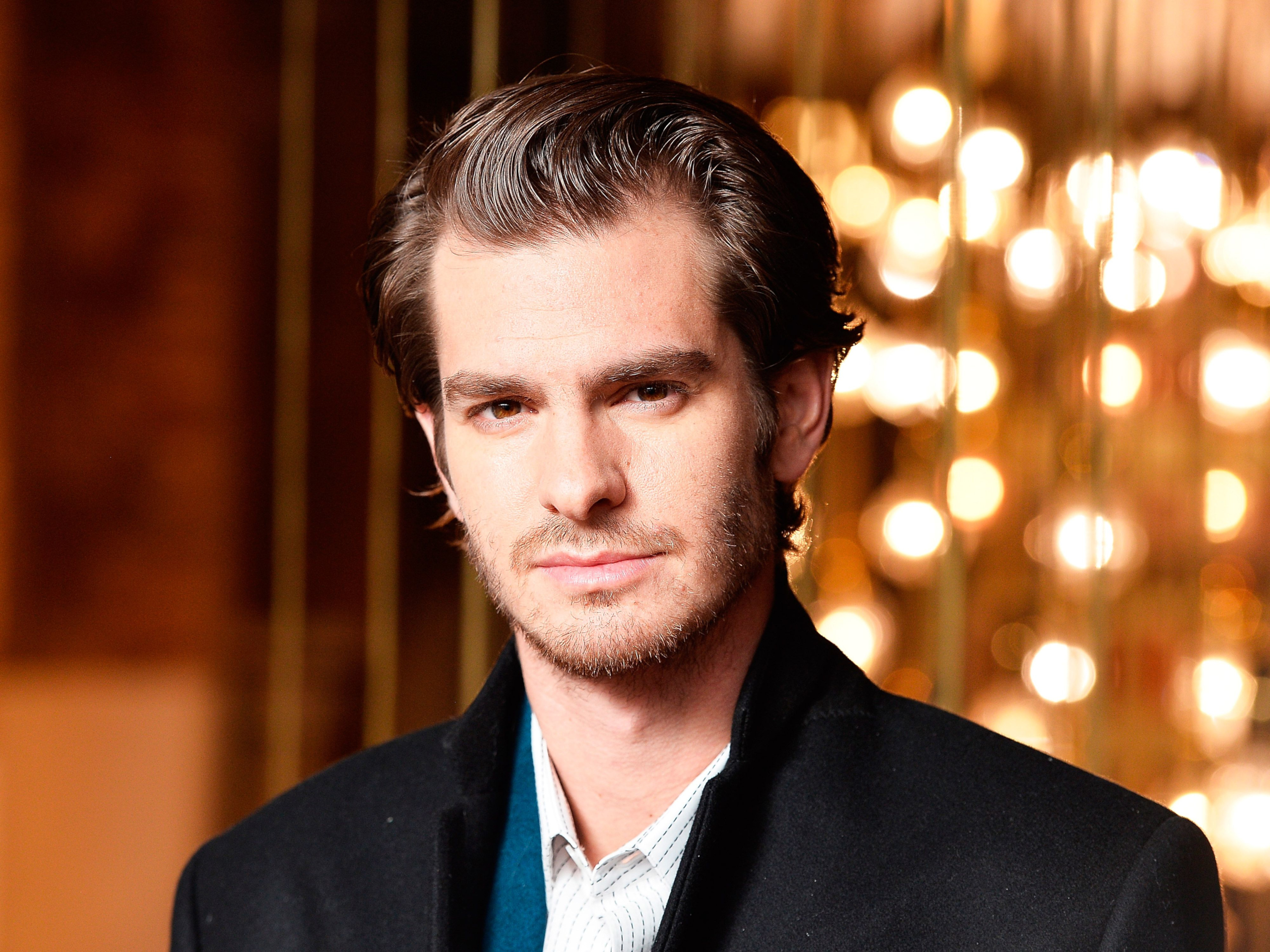 Andrew Garfield portrait with warm bokeh lights HD Wallpaper