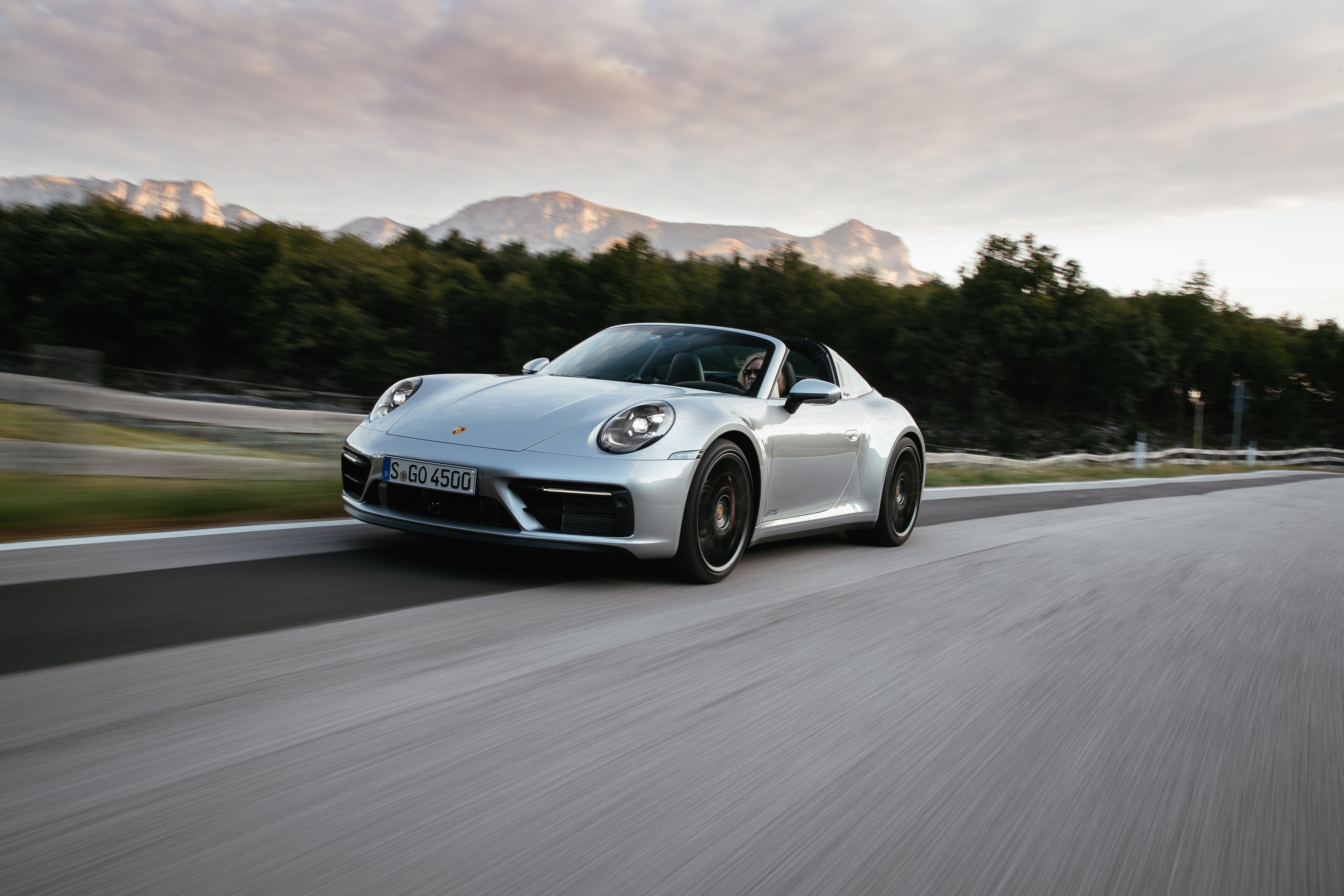 Porsche 911 Targa 4 GTS sport car on scenic road HD Wallpaper