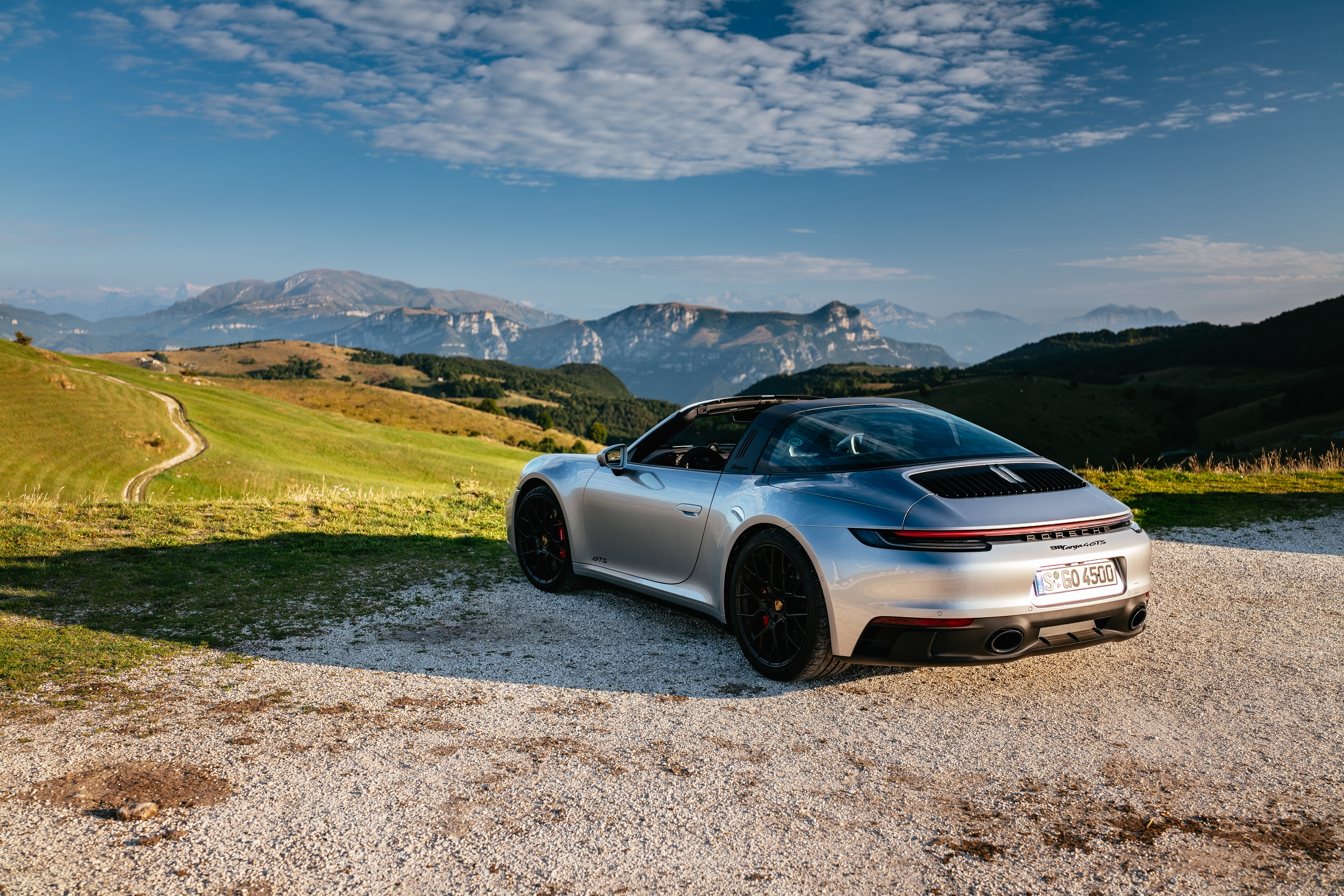 Porsche 911 Targa 4 GTS in scenic mountain landscape HD Wallpaper
