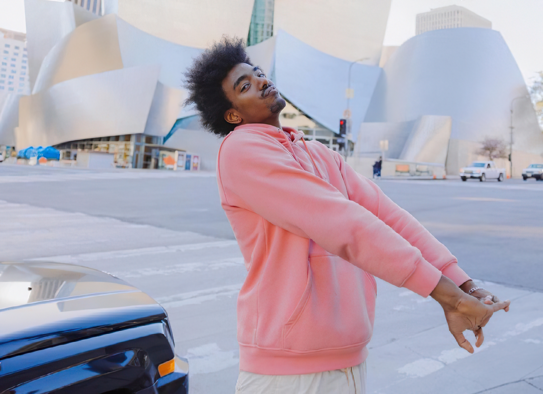 Tai Verdes in pink hoodie at Walt Disney Concert Hall HD Wallpaper