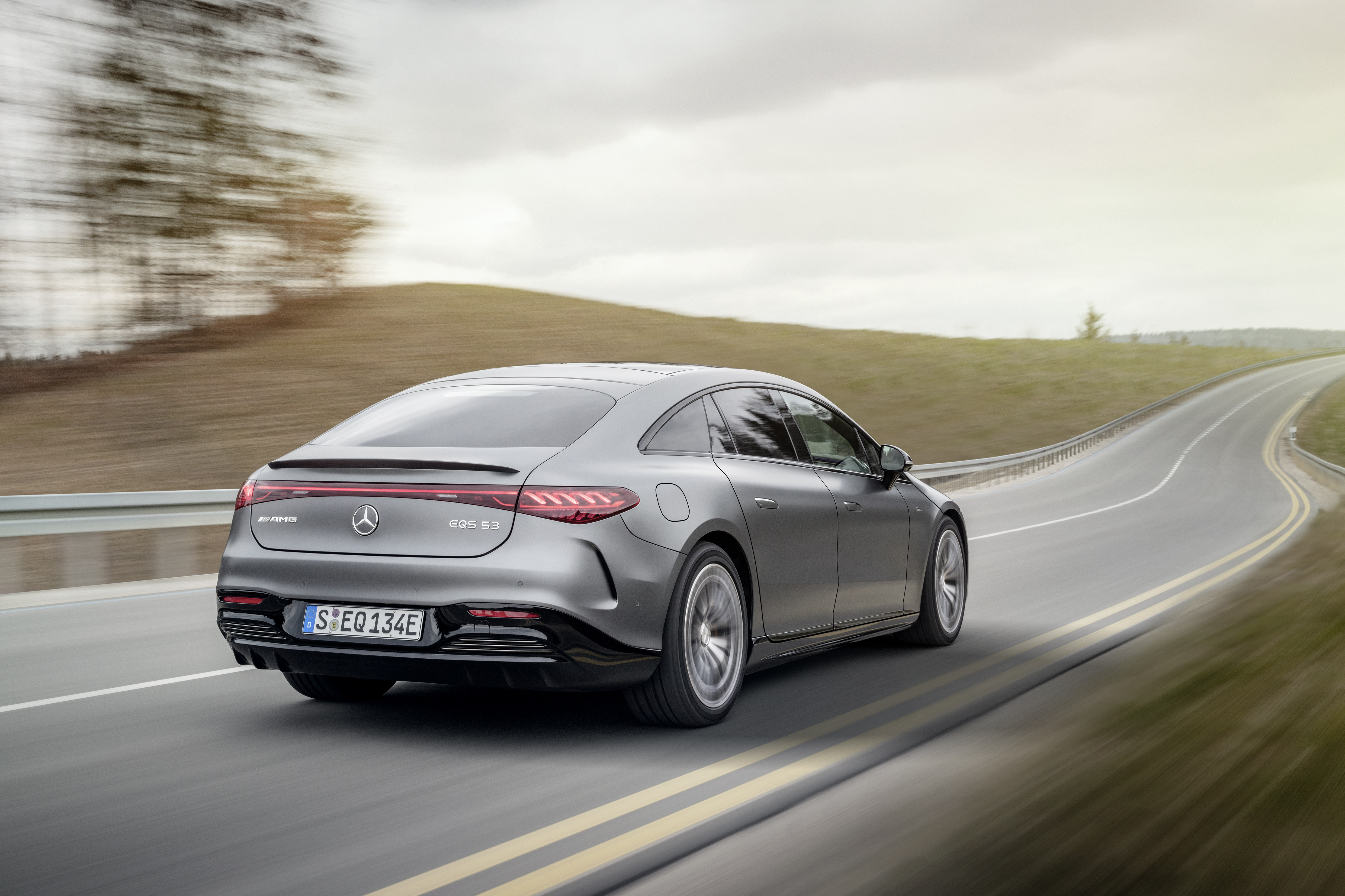 Mercedes-AMG EQS 53 Electric Luxury Car on Winding Road HD Wallpaper