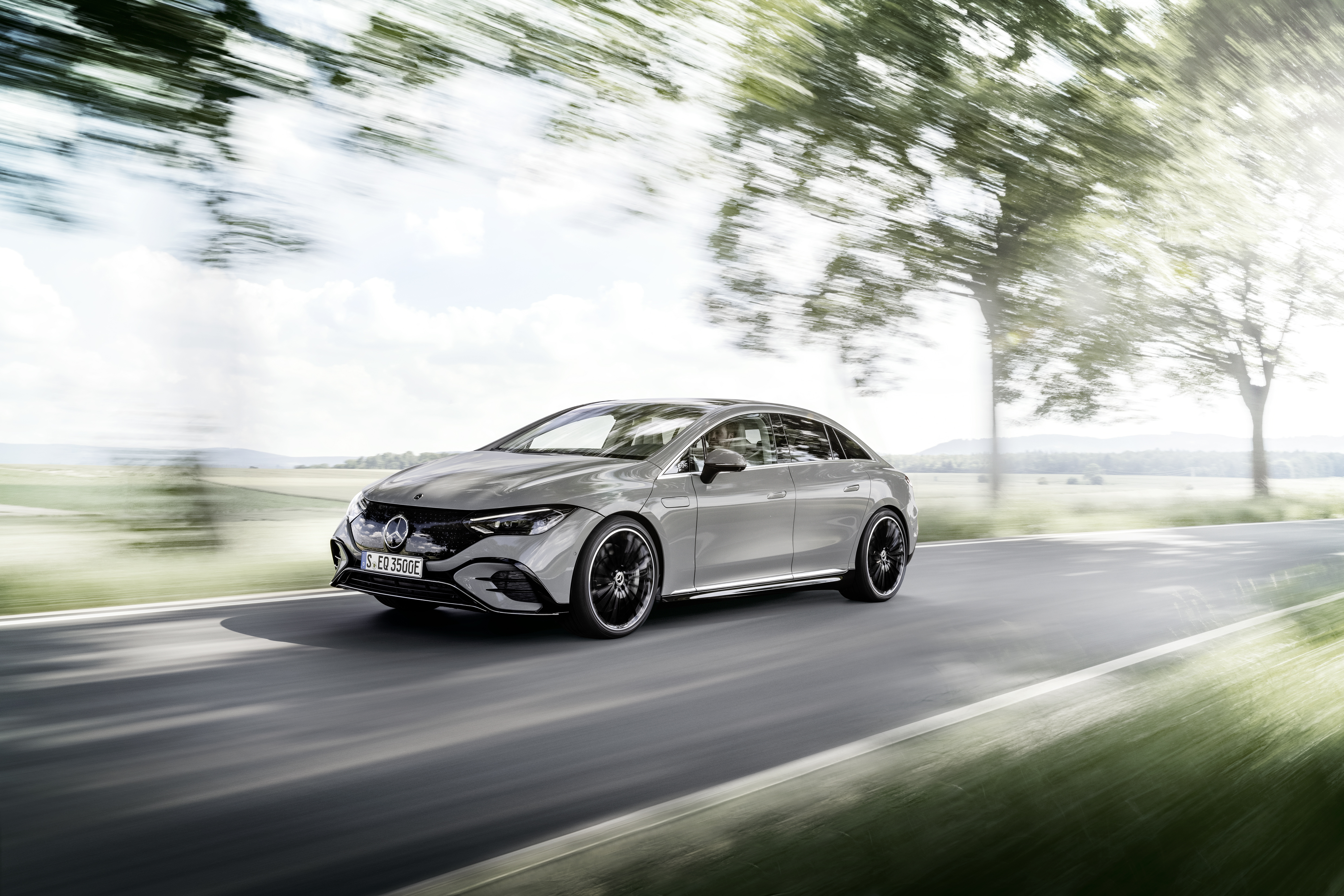Mercedes-Benz EQE 350 AMG Line electric car in motion HD Wallpaper