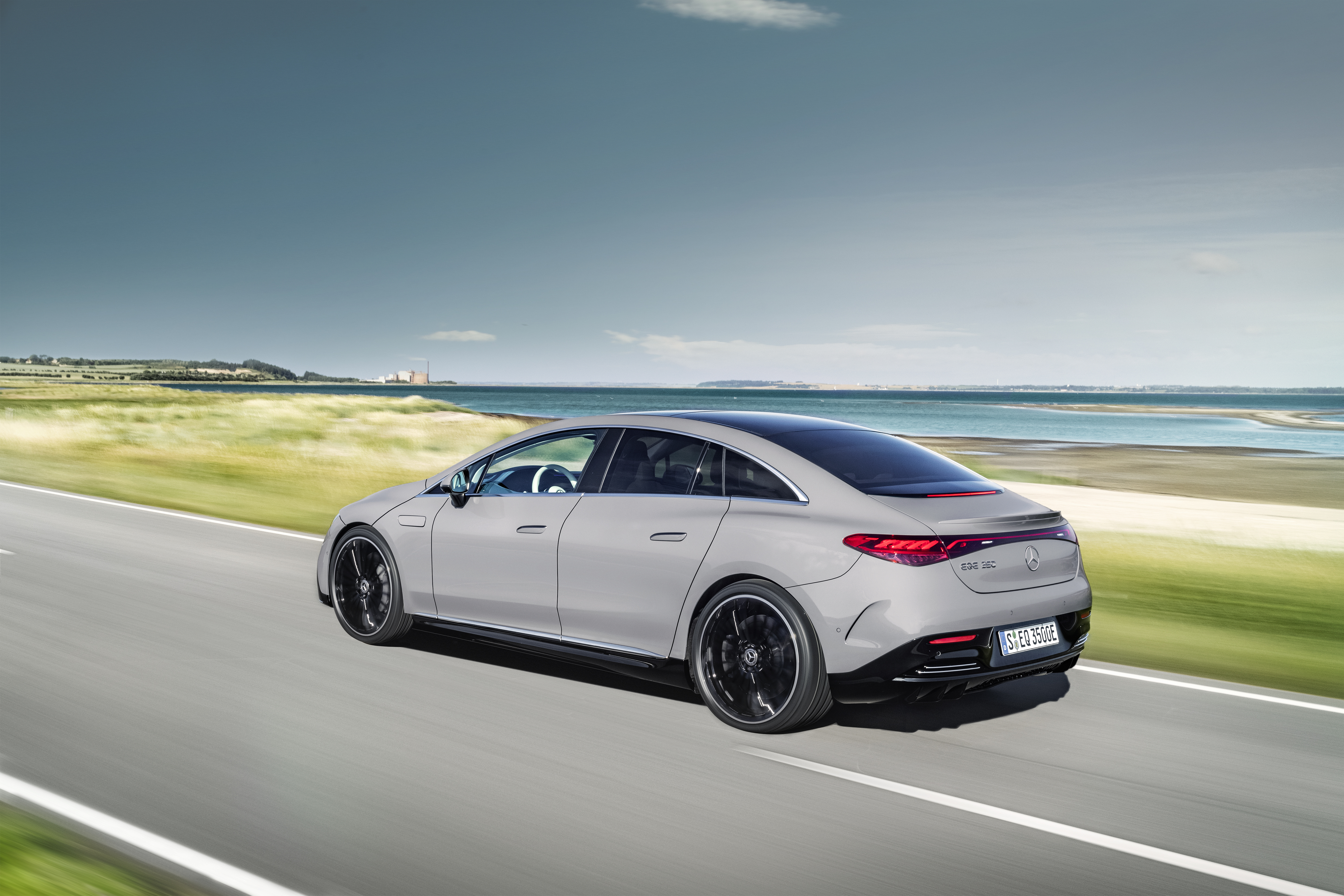 Mercedes-Benz EQE 350 Electric Car on Coastal Road HD Wallpaper