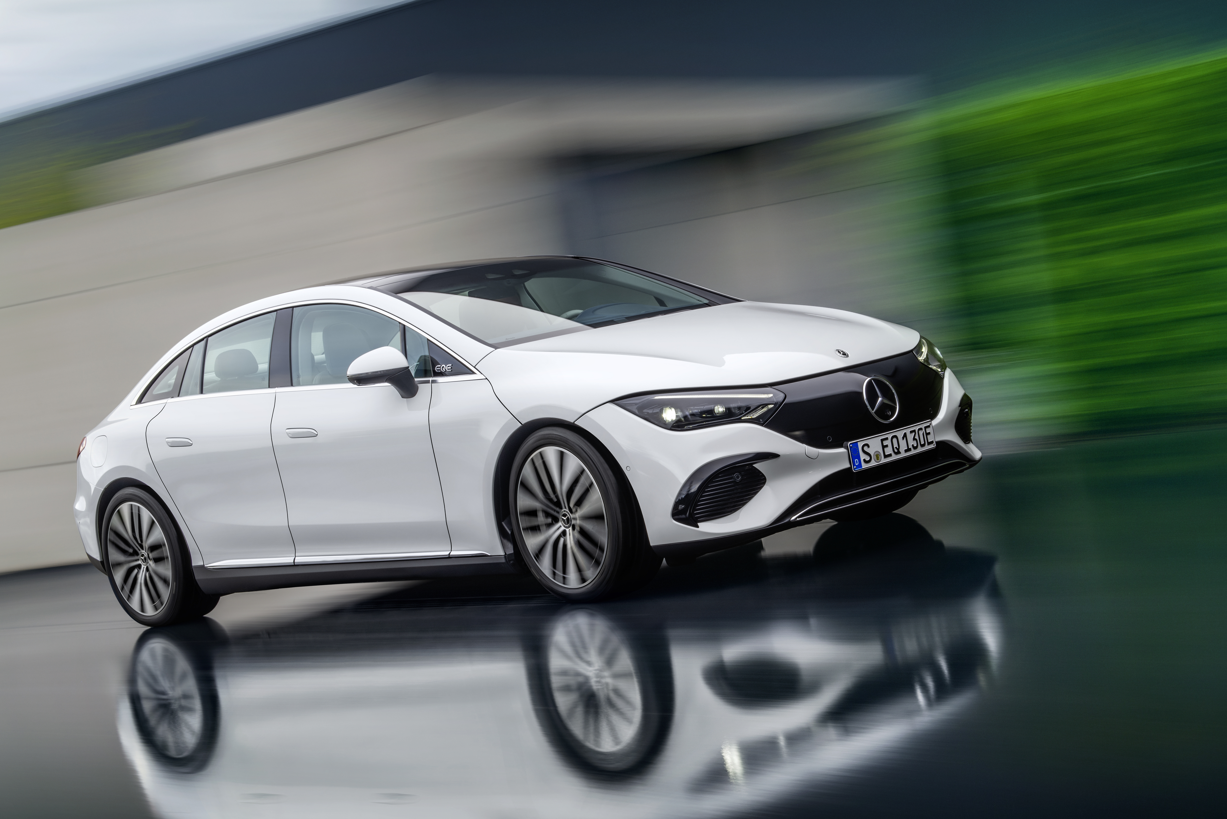White Mercedes-Benz EQE 350 Electric Luxury Car in Motion HD Wallpaper
