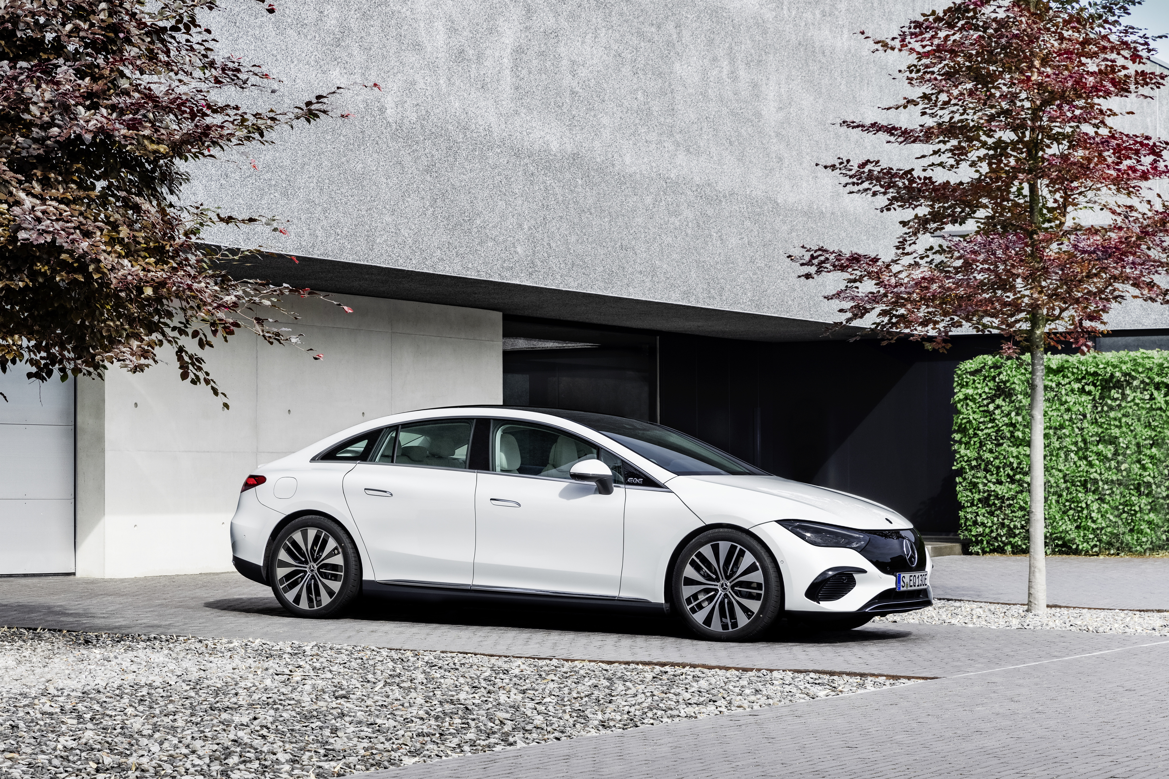 White Mercedes-Benz EQE 350 Electric Art Line luxury car HD Wallpaper