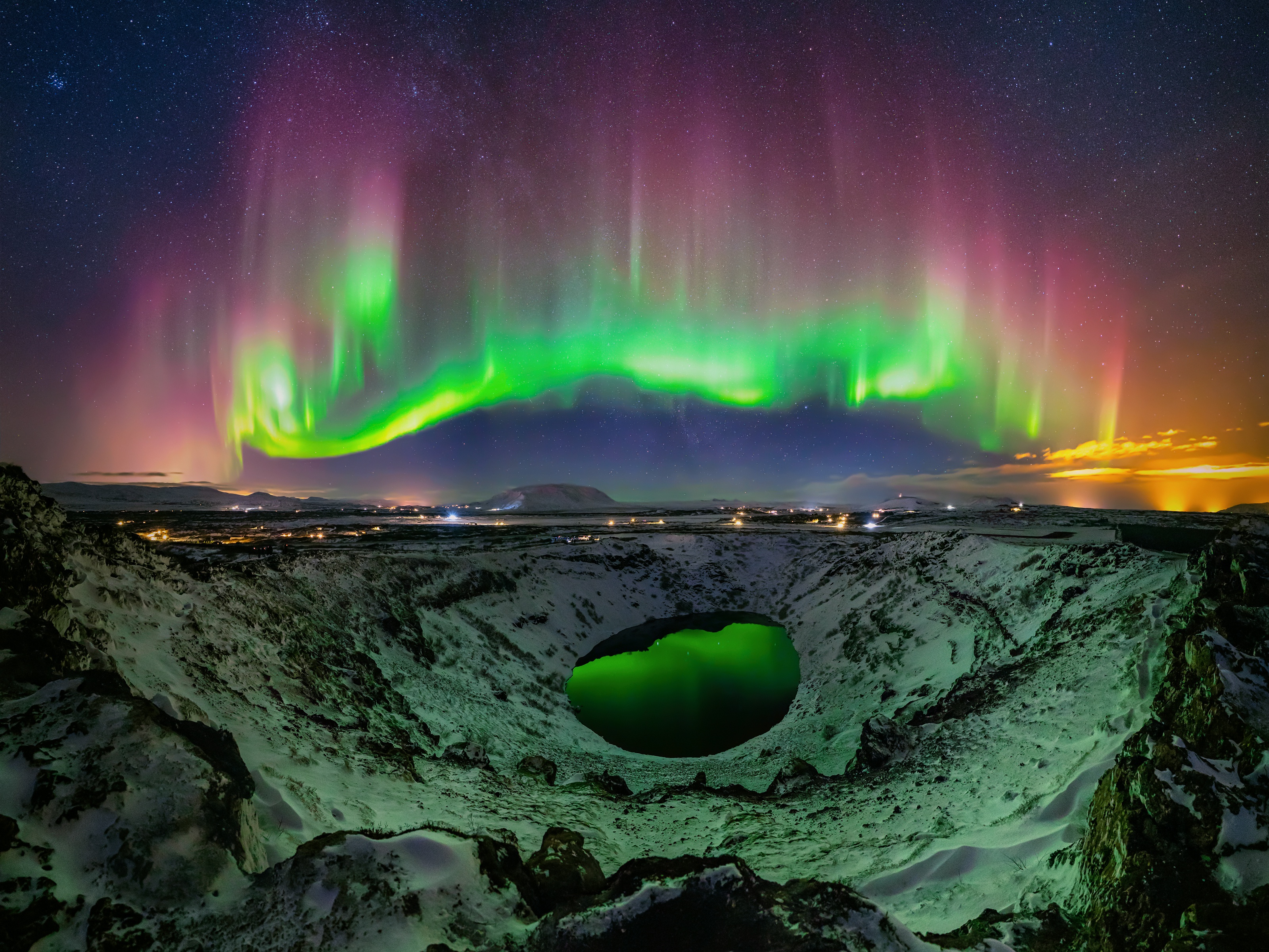Vibrant Aurora Borealis over Green Crater Lake HD Wallpaper