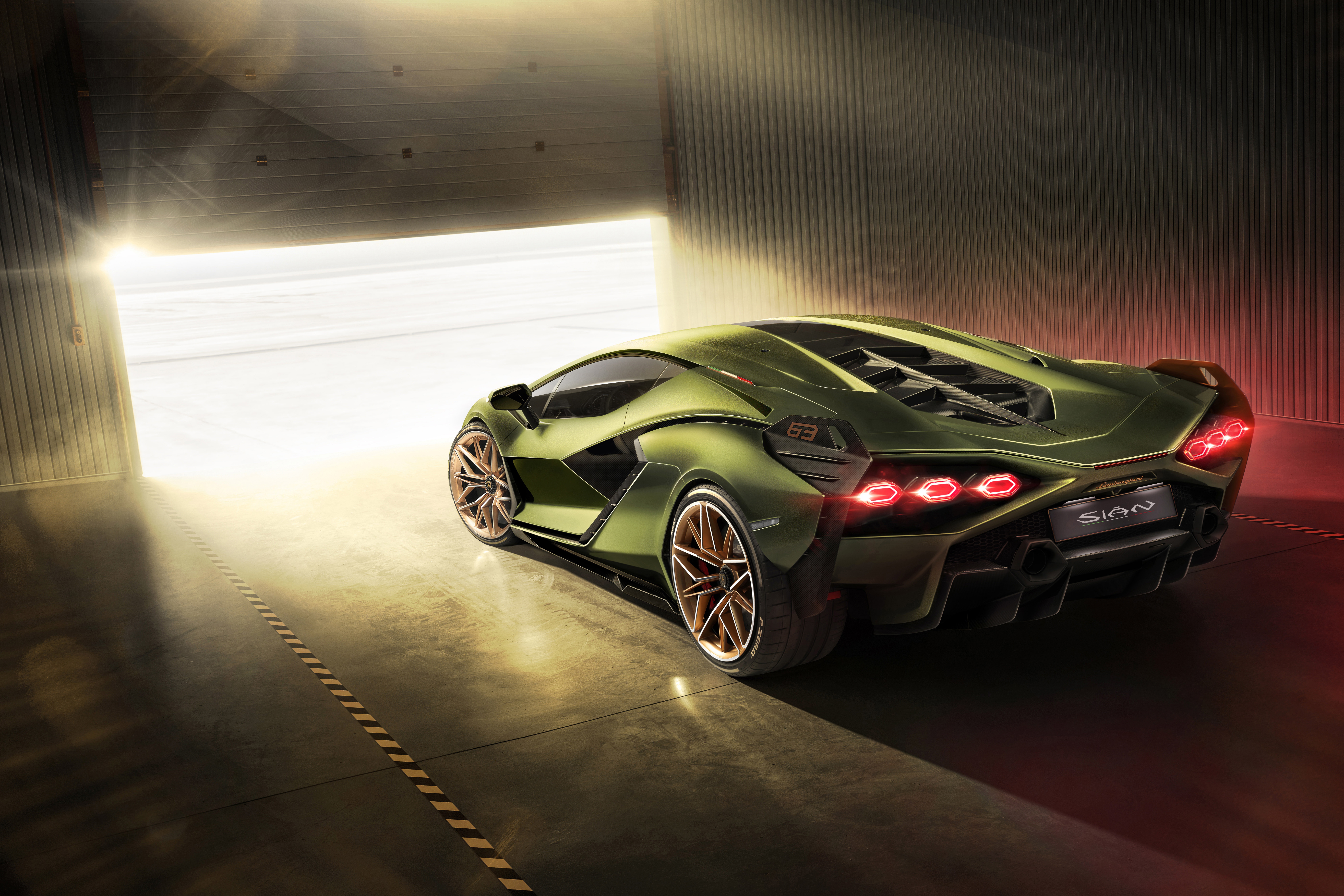 Green Lamborghini Sián FKP 37 Supercar Emerging from Hangar HD Wallpaper