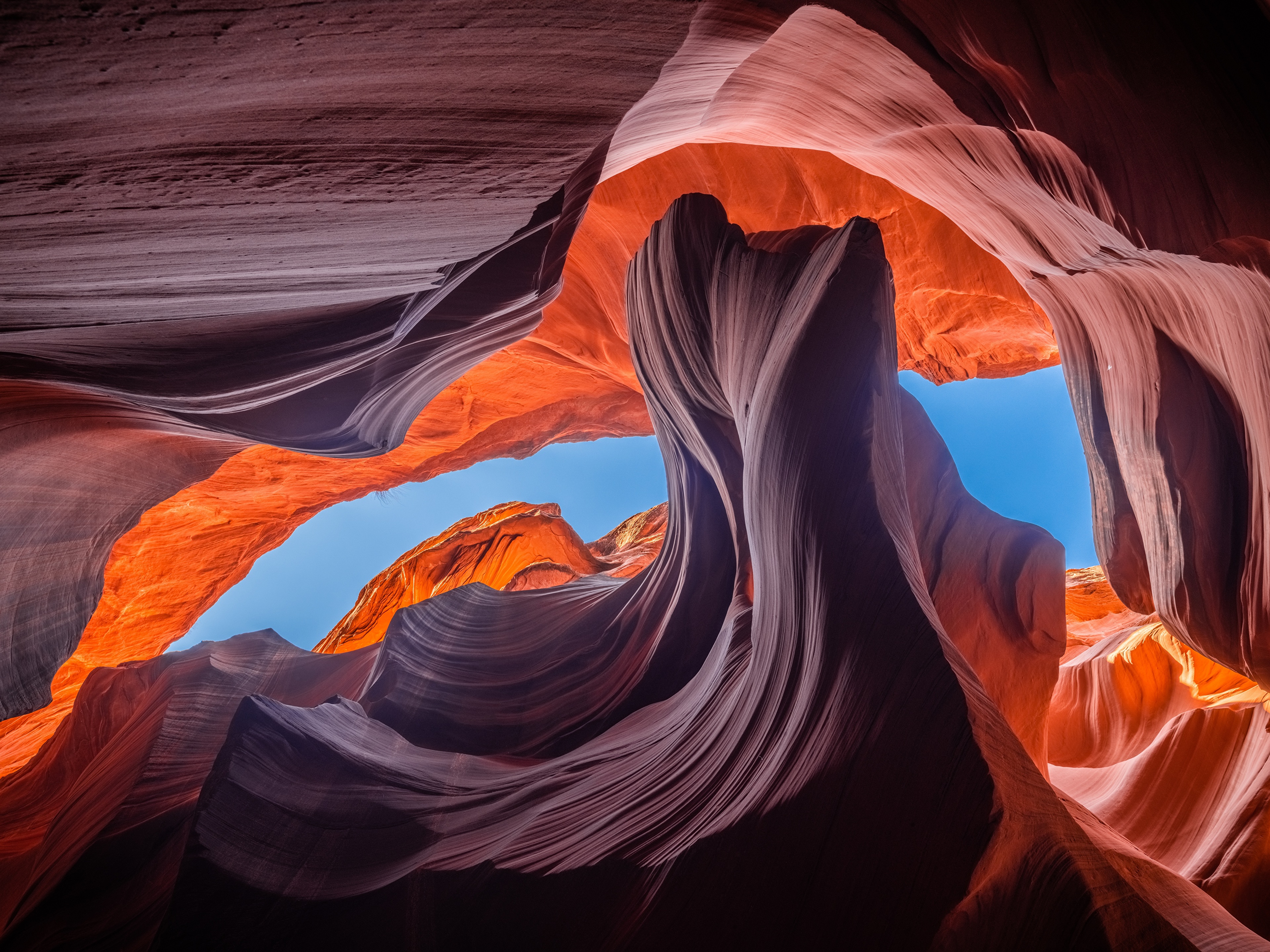 Antelope Canyon's Swirling Sandstone Walls and Blue Sky HD Wallpaper