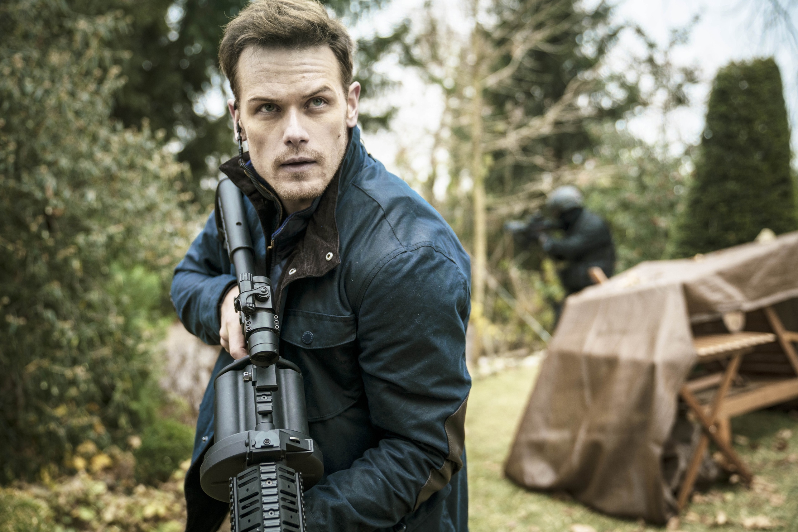 Sam Heughan holding weapon in SAS: Red Notice HD Wallpaper