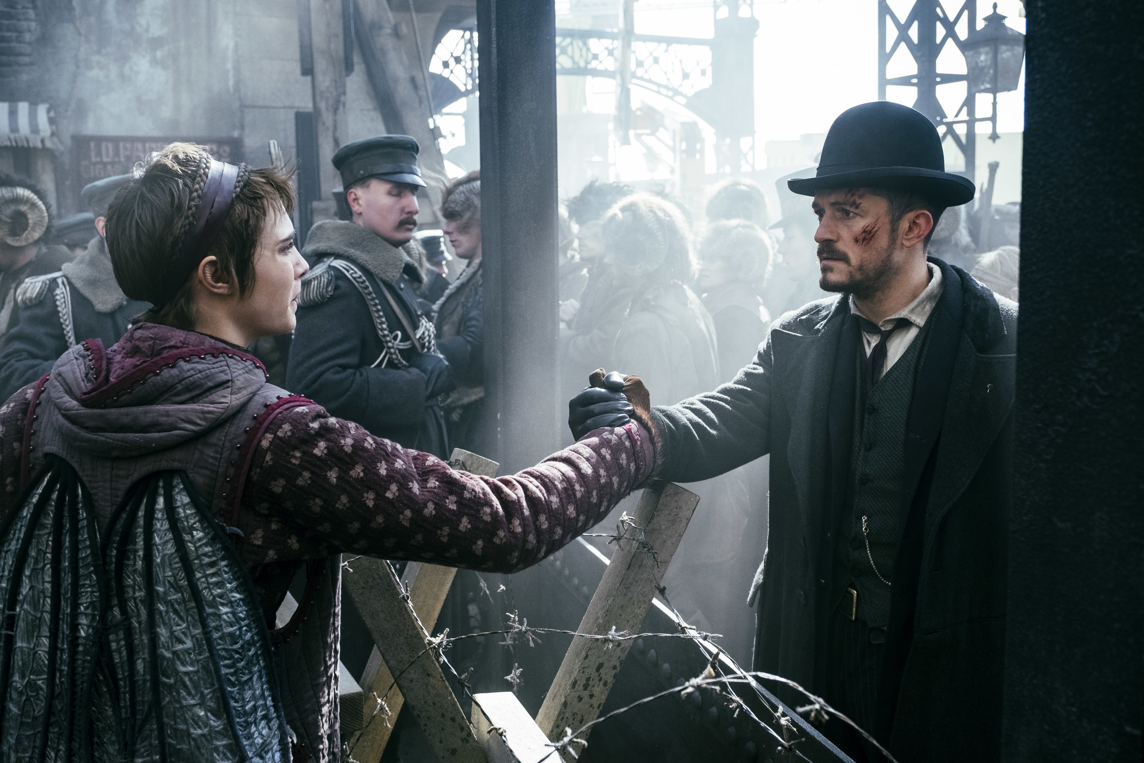 Carnival Row: Vignette and Philo across barbed wire HD Wallpaper