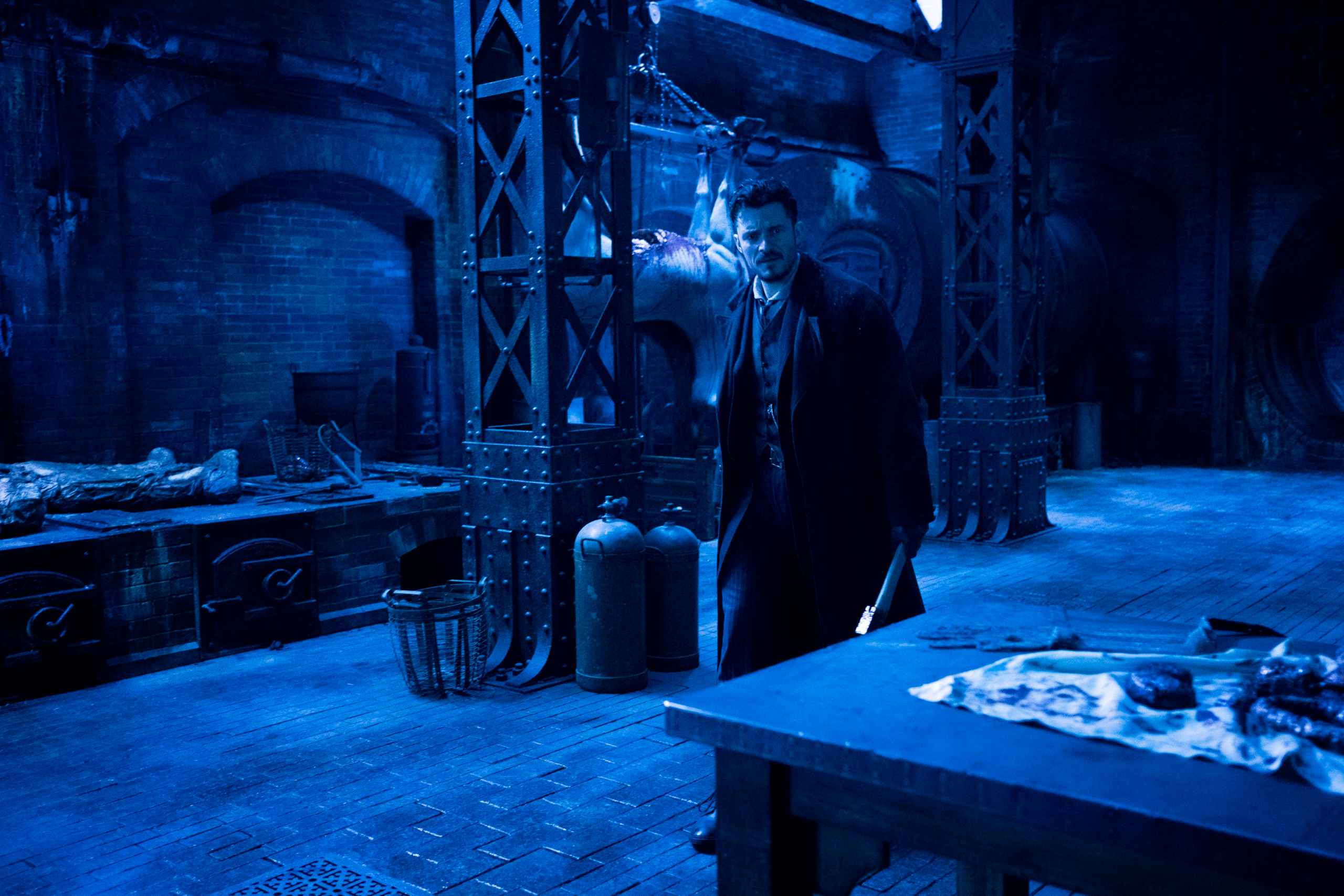 Rycroft Philostrate in a dark blue, grim industrial room HD Wallpaper
