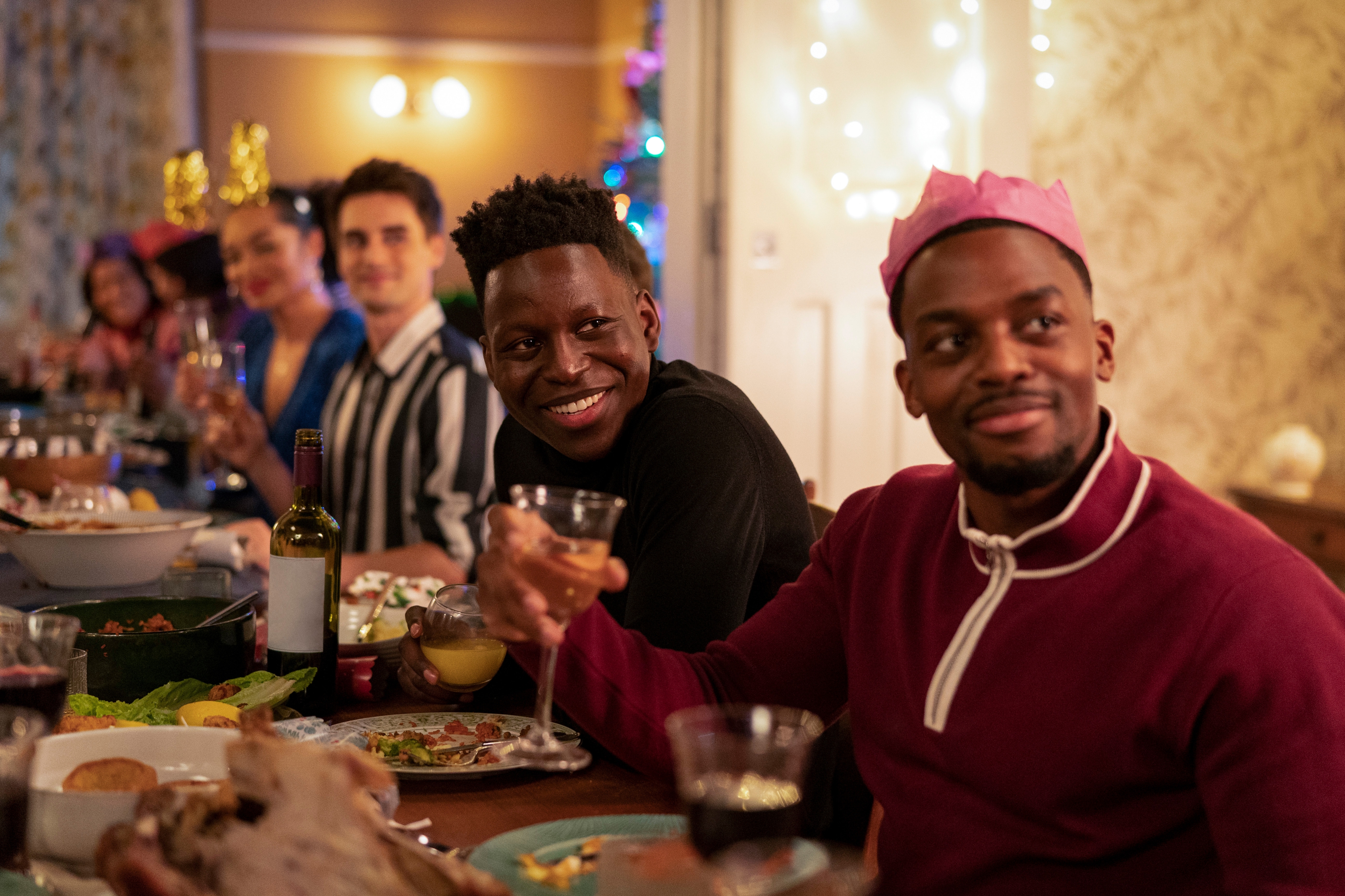 Ted Lasso: Sam and Isaac celebrating at dinner HD Wallpaper