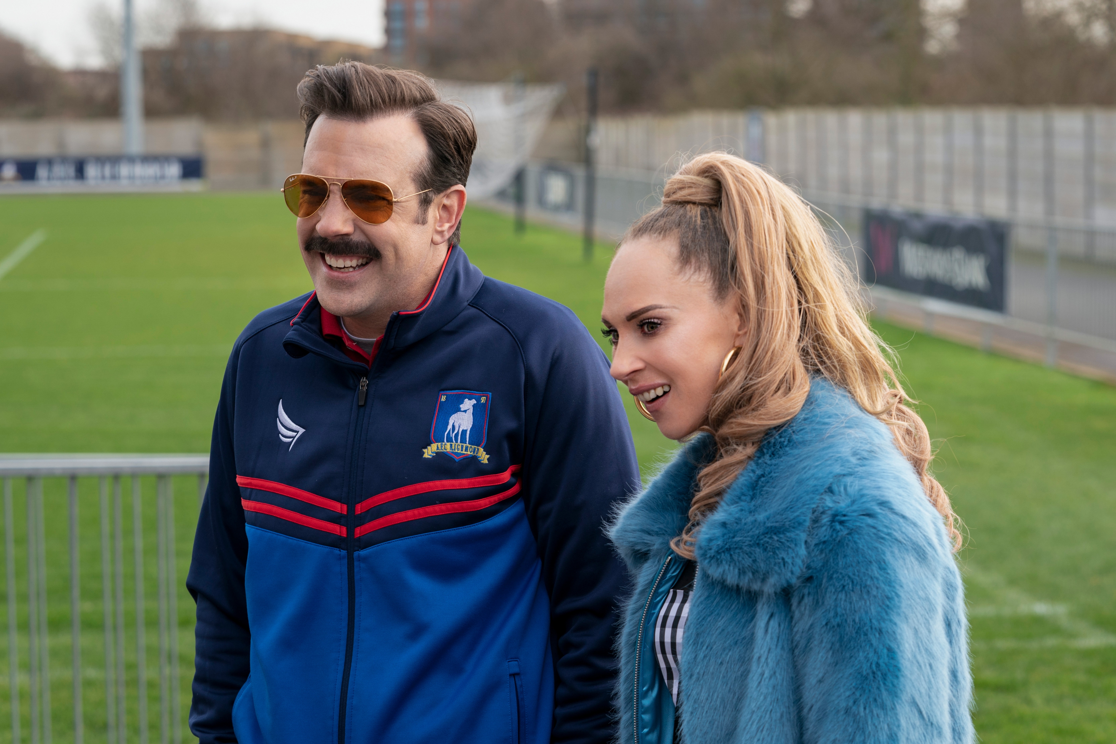 Ted Lasso and Keeley Jones smiling HD Wallpaper