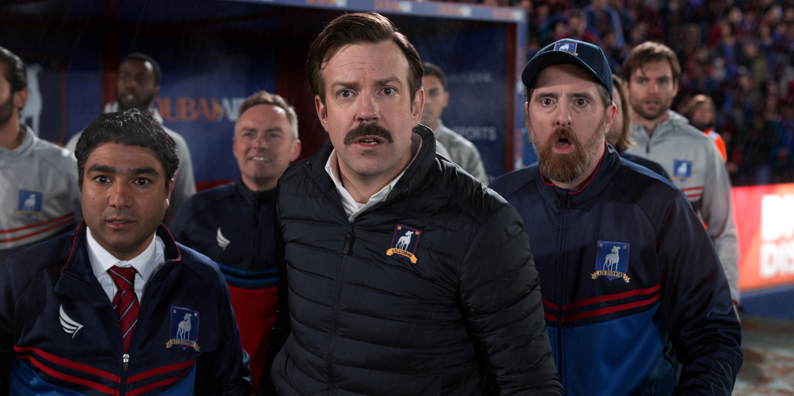 Ted Lasso and coaches look shocked on the sideline HD Wallpaper