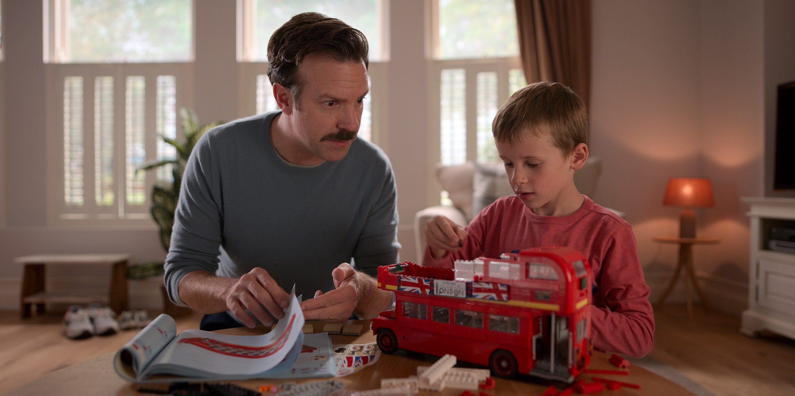 Ted Lasso and son building a London bus HD Wallpaper