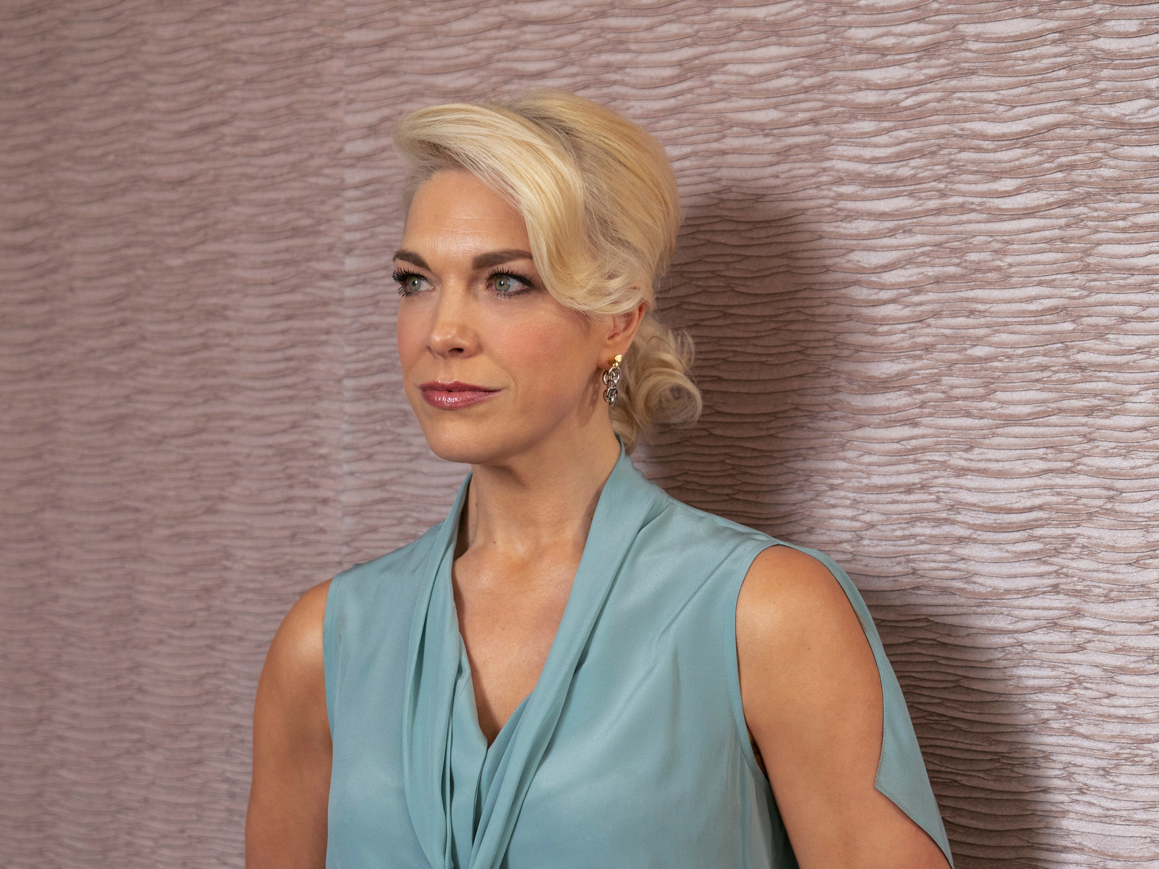 Hannah Waddingham from Ted Lasso in light blue top HD Wallpaper