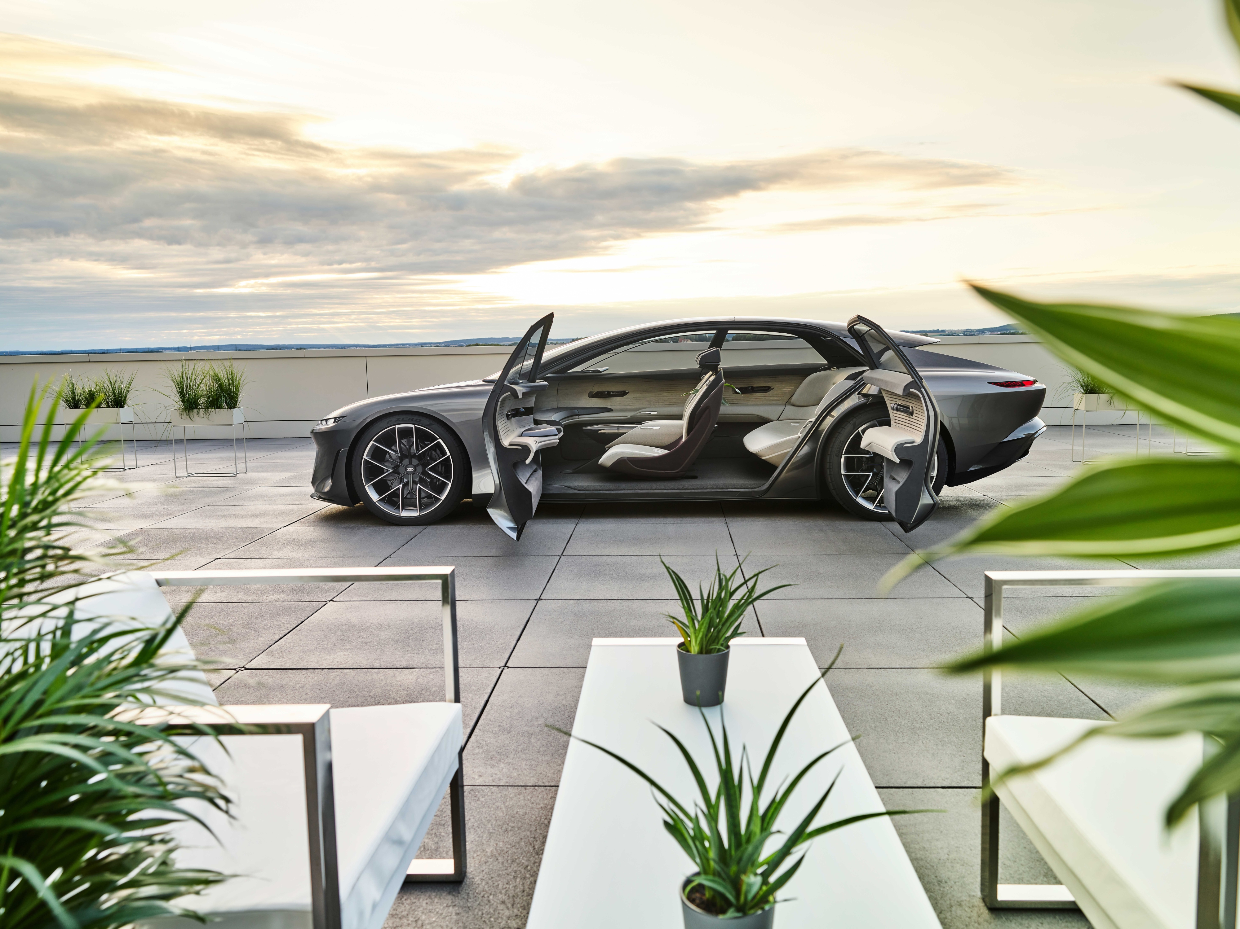 Audi Grandsphere Concept: Luxury Electric Car on Rooftop Terrace HD Wallpaper