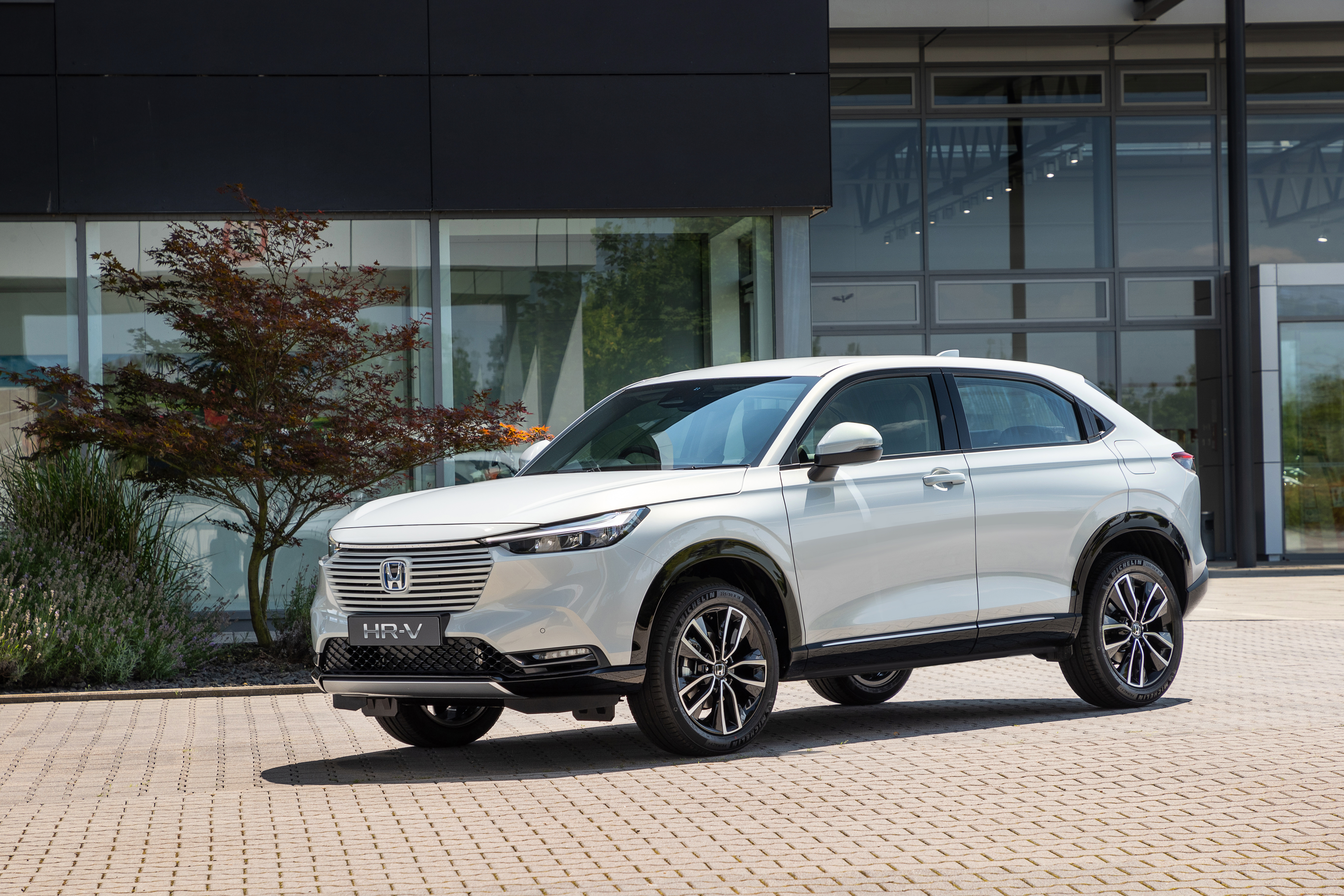White Honda HR-V e:HEV SUV parked outside HD Wallpaper