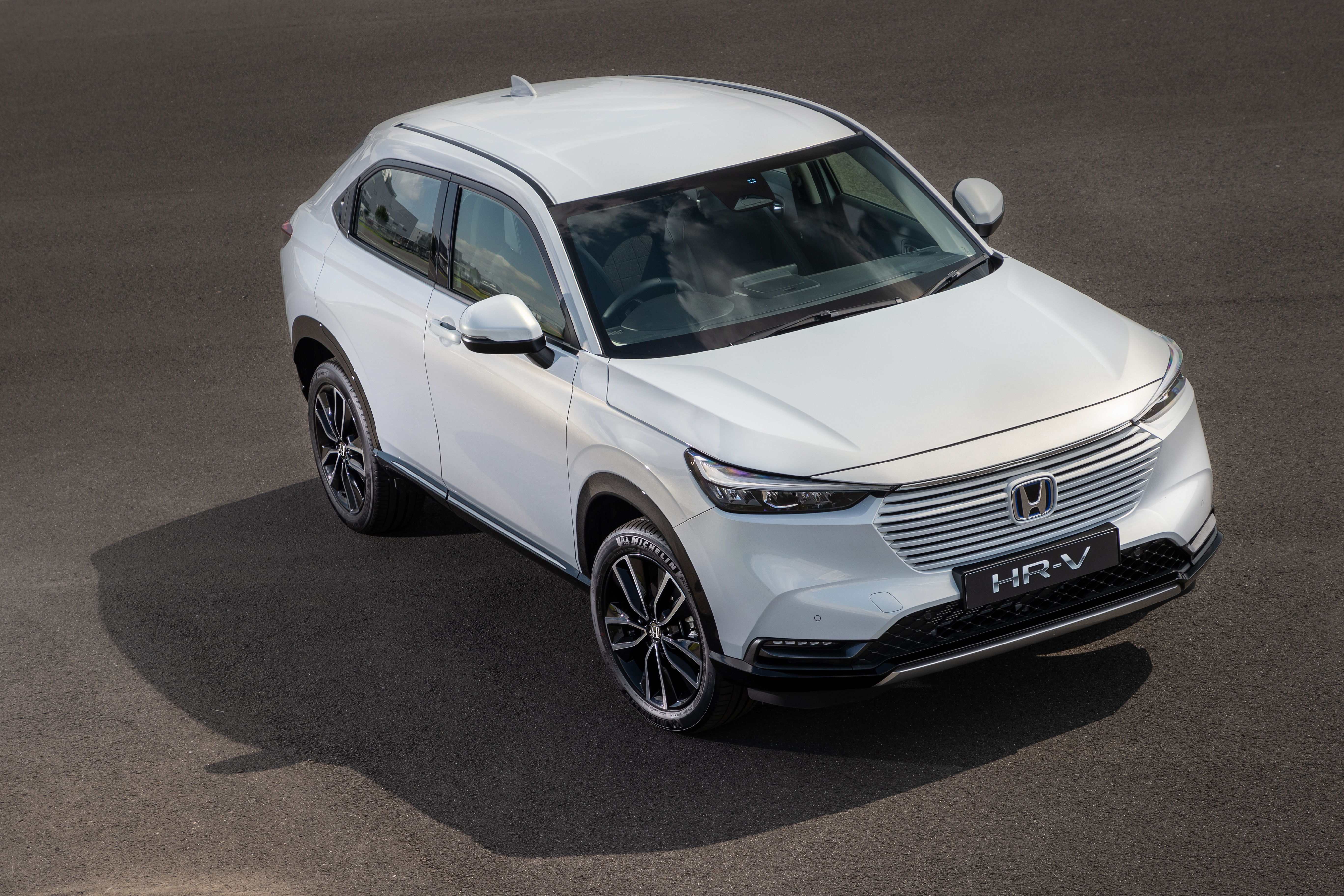 White Honda HR-V e:HEV SUV from above HD Wallpaper