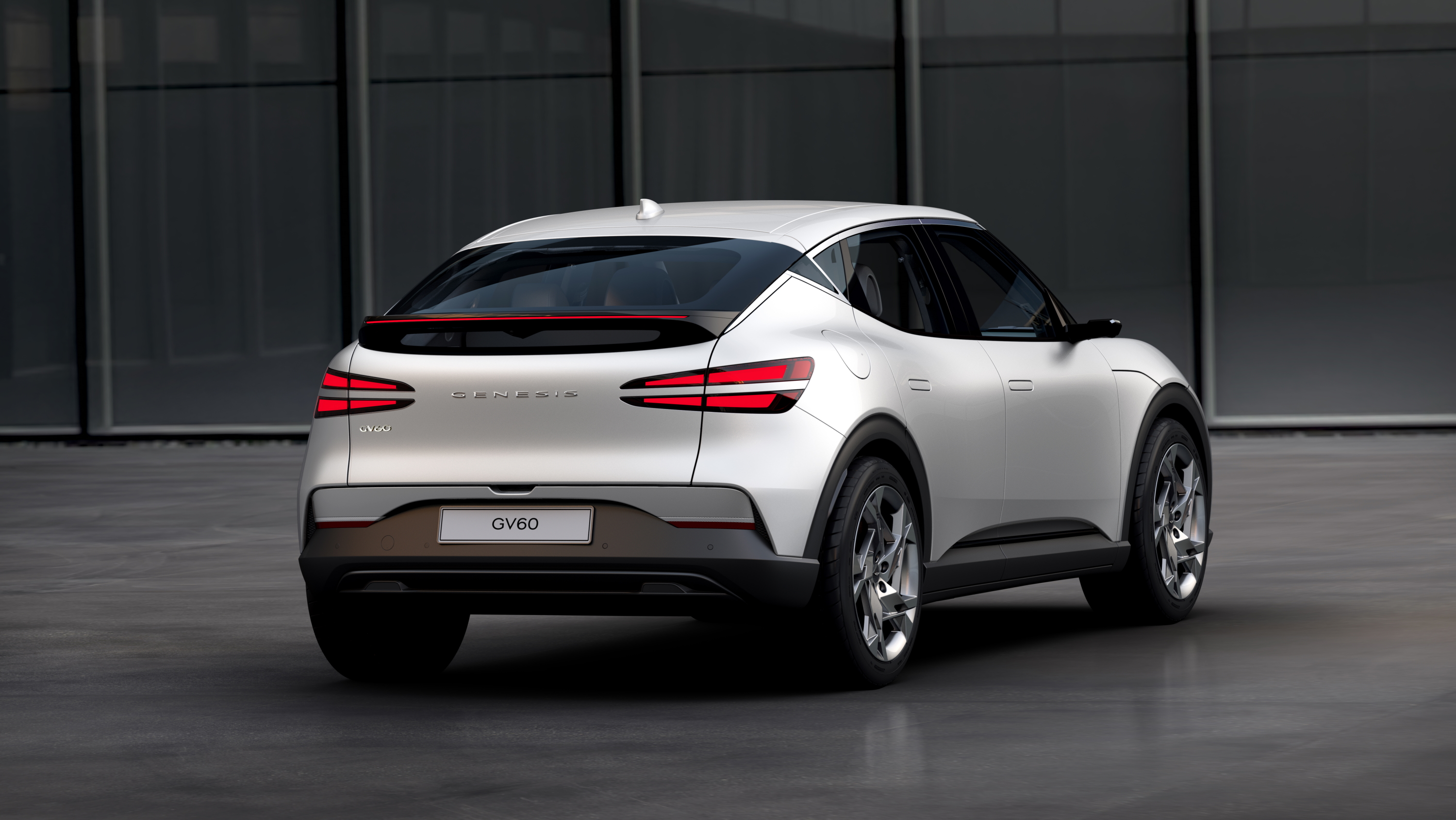 White Genesis GV60 SUV rear view HD Wallpaper